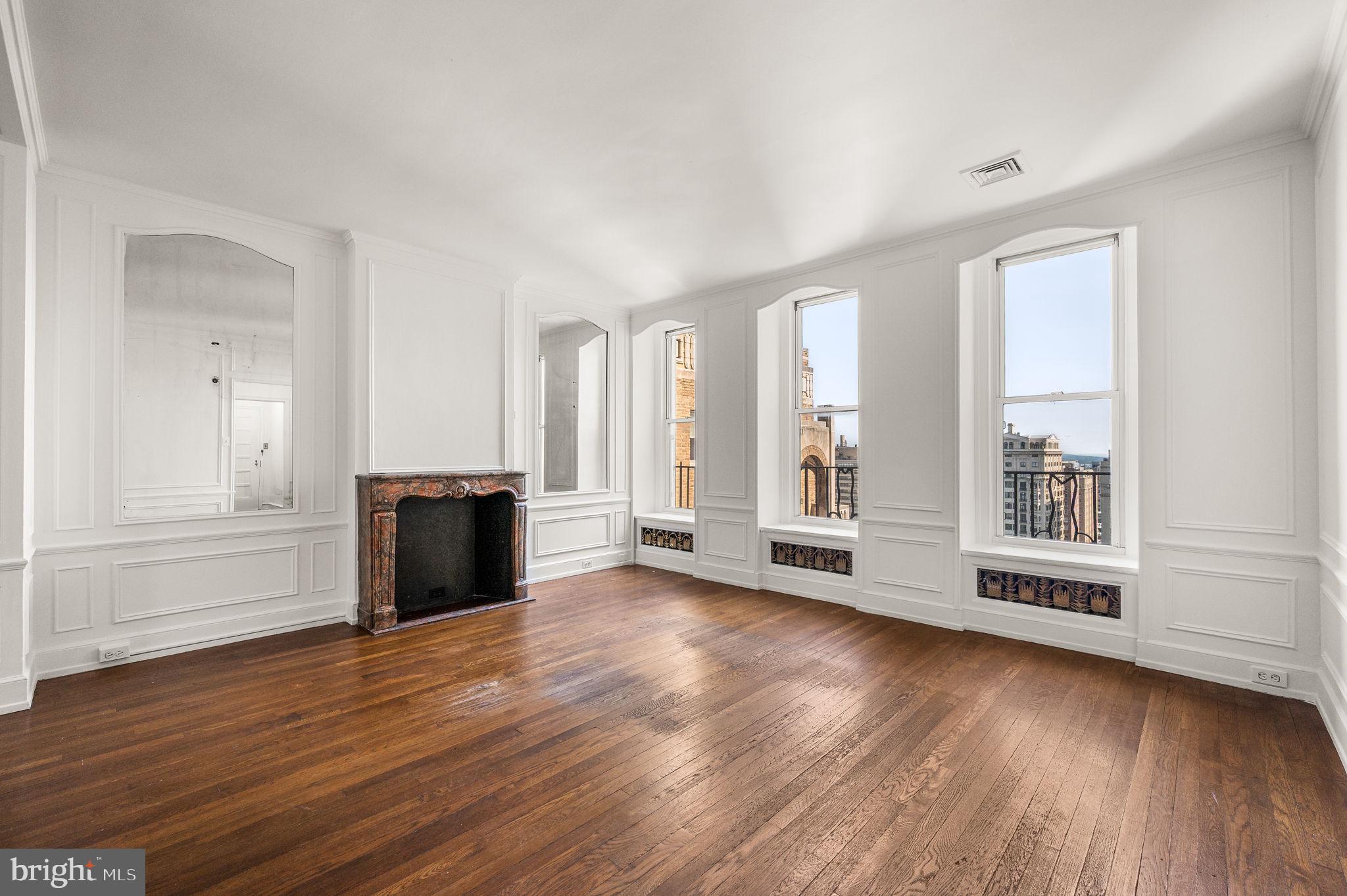 High above the treetops on the 20th floor of Rittenhouse Plaza, this expansive 1 bedroom residence offers the perfect canvas for a buyer to craft a truly personalized home on Rittenhouse Square. With over 900 sq ft, this is one of the larger one-bedroom layouts on the Square and among the rare few that offer direct Park views and radiant Southern exposure. This prewar gem is brimming with original character: solid oak floors with mahogany inlay, classic moldings, generous ceiling heights, and gracious proportions throughout. Whether you envision a restoration of its historic elegance or a sleek modern retreat, the scale and setting of this home are unmatched. The views are forever. The potential is limitless.
Rittenhouse Plaza is one of Philadelphia’s rare New York-style prewar co-ops, known for its architectural elegance, private courtyard garden, and exceptional service. This pet-friendly building offers a 24-hour concierge and unmatched access to the best of Center City. The monthly co-op fee includes real estate taxes, Fios cable and internet, heat, water, sewer, and building maintenance. A one-time transfer fee equal to 1% of the purchase price is payable at closing. Nearby parking options are available for rent within one block.