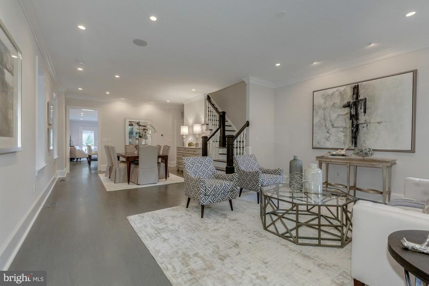 Completely renov home featuring a meticulously updated facade w/an open & airy floor plan & spectacular outdoor living spaces. Main lvl feat. open LR/DR & gourmet, eat-in Kit w/top-of-the-line finishes & appliances. 4BR + office/3.5 spa baths. LL Fam Rm w/wet bar. Front porch & large, professionally designed garden w/custom decking & patio. Abundant storage & smart home tech.