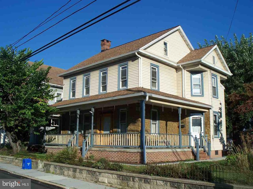 Spacious Home w/ Natural Woodwork, New Kitchen & Windows, Newer Roof, @ 2 zone Central Air. 4 Bedrooms, 2.5 Baths on a Larger Lot. Detached 2 Story 2 Car Garage w/ Workshop and Lots of Parking - Shed w/ Concrete Floor & Electric. Wrap around porch w/ 2 tier deck. Kitchen Features a Breakfast Bar, Recessed Lights & Corian Counters.  Bay Windows and Much More.