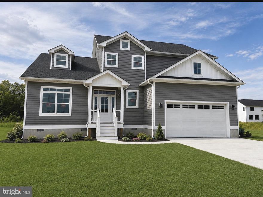Brand new construction nearing completion — just in time for the summer season! This impressive home offers over 3,400 square feet of living space with 5 bedrooms, 3.5 baths, and a bonus room, providing exceptional flexibility for today’s lifestyle. Located on a quiet cul-de-sac in Triple Crown Estates, a community known for its larger lot sizes, this property features a generous 125’ x 100’ homesite.
The home offers two primary suites — one on each level. The first-floor primary suite features a beautifully tiled shower, while all full bathrooms are equipped with double-bowl vanities. The stunning kitchen showcases quartz countertops and stainless steel appliances and flows seamlessly into the dining area, which opens to a screened porch and deck, perfect for indoor-outdoor living. The family room is warm and inviting with a linear electric fireplace and a beam-accented vaulted ceiling.

Additional highlights include 9’ ceilings on the first floor, LVP flooring throughout the first floor and staircase, a dedicated laundry room, and an 80-gallon hot water heater. The oversized two-car garage features 12’ ceilings, offering excellent potential for additional storage space. The bonus room is separately conditioned with its own split HVAC system, making it ideal for a media room, home office, playroom, or guest retreat.

Enjoy all that Ocean Pines has to offer, including multiple pools, golf course, marina, yacht club, beach club in Ocean City, parks, walking trails, and year-round community amenities. Builder Registration #9569.