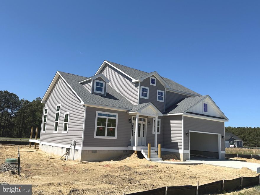 Brand new construction with an anticipated May completion - just in time for the summer season! This impressive home offers over 3,400 square feet of living space with 5 bedrooms, 3.5 baths, and a bonus room, providing exceptional flexibility for today’s lifestyle.

Located on a quiet cul-de-sac in Triple Crown Estates, a community known for its larger lot sizes, this property features a generous 125’ x 100’ homesite. The home also offers two primary suites - one on each level. The first-floor primary suite features a beautifully tiled shower, while all full bathrooms are equipped with double-bowl vanities. The stunning kitchen showcases quartz countertops and stainless steel appliances and flows seamlessly into the dining area, which opens to a screened porch and deck, perfect for indoor-outdoor living. The family room is warm and inviting with a linear electric fireplace and a beam-accented vaulted ceiling.

Additional highlights include 9’ ceilings on first floor,  LVP flooring throughout the first floor and staircase, an oversized two car garage with 12' ceiling height, a dedicated laundry room, and an 80-gallon hot water heater. Enjoy all that Ocean Pines has to offer, including multiple pools, golf course, marina, yacht club, beach club in Ocean City, parks, walking trails, and year-round community amenities. Builder Registration # 9569.