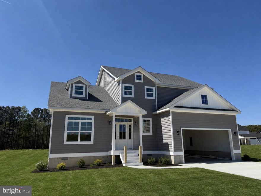 Brand new construction with an anticipated May completion - just in time for the summer season! This impressive home offers over 3,400 square feet of living space with 5 bedrooms, 3.5 baths, and a bonus room, providing exceptional flexibility for today’s lifestyle.

Located on a quiet cul-de-sac in Triple Crown Estates, a community known for its larger lot sizes, this property features a generous 125’ x 100’ homesite. The home also offers two primary suites - one on each level. The first-floor primary suite features a beautifully tiled shower, while all full bathrooms are equipped with double-bowl vanities. The stunning kitchen showcases quartz countertops and stainless steel appliances and flows seamlessly into the dining area, which opens to a screened porch and deck, perfect for indoor-outdoor living. The family room is warm and inviting with a linear electric fireplace and a beam-accented vaulted ceiling.

Additional highlights include 9’ ceilings on first floor,  LVP flooring throughout the first floor and staircase, an oversized two car garage with 12' ceiling height, a dedicated laundry room, and an 80-gallon hot water heater. Enjoy all that Ocean Pines has to offer, including multiple pools, golf course, marina, yacht club, beach club in Ocean City, parks, walking trails, and year-round community amenities. Builder Registration # 9569.