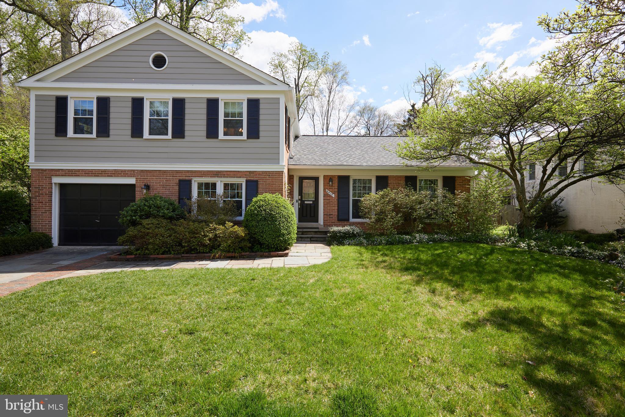 Offers, if any, are due Tuesday, April 30th at 2pm.
Very occasionally, a house that not only meets your needs, but surpasses expectations with a rarified mix of space, condition and location comes to the market. 6415 is just that offering.
Beautifully updated and lovingly maintained, this four bedroom, two full and one half bath Mass Avenue Forest home is entirely move-in ready. The welcoming facade boasts undeniable curb appeal and sets the tone for the spacious and sun-filled interior. Formal living and dining rooms showcase classic details like hardwood floors and a delightful gas fireplace. A sleek and fully redone chef’s kitchen with its stone counters and cabinet space galore opens onto a sun-filled solarium expansion that affords plenty of space for a breakfast table and lounge chairs to relax and take in the views of the gorgeous rear yard. The oversized family room is arguably the heart of the home and is outfitted with brand new, top-quality wood tone flooring and super stylish (and fantastically functional) built-ins. A perfectly placed powder room is located just off of this great space, as is the flexible home office that can play double duty as an extra guest room or a quiet homework station. The garage provides generous room for one car parking plus plenty of extra storage.
The upper level furthers the theme of quality and roominess with four true bedrooms, including a king-size primary suite with excellent dual closets and a stylishly renovated en-suite bath. A fully updated hall bath serves the other three terrific bedrooms, while an easily accessed attic space allows for an astonishing amount of storage. The lower level serves a multitude of functions that includes a laundry station, plenty of storage, and a bonus lounge area that’s a great gathering place for casual TV and video game time. The same luxury flooring that was just installed in the family room has been added here, too.
And OH, the yard! Serene, verdant, private, and peppered with an incredible array of mature trees, blooming shrubs, and perennials, this fully fenced, over quarter acre lot is nothing short of magical. Take in the delightful views from the slate patio that sits just off of the solarium and family room, all the while being visited by a colorful and varied assembly of birds. It’s a simply lovely place to be. The sought-after neighborhood is, too, with incredible access to everything like schools, shopping, and recreation spots all super close by. Merrimack Pool sits a stone’s throw away and is an added and fabulous feature that enhances an already amazing location and community.
The list of seller improvements is truly impressive. New HVAC system (2017), full kitchen renovation (2017), new roof (2018), new sliding doors and windows throughout (2020), new baths (2022), new interior doors (2023), new family room and lower level flooring (2024), and fresh paint throughout (2024) are just the highlights of this impressive tally. This home truly is the one you have been waiting for!