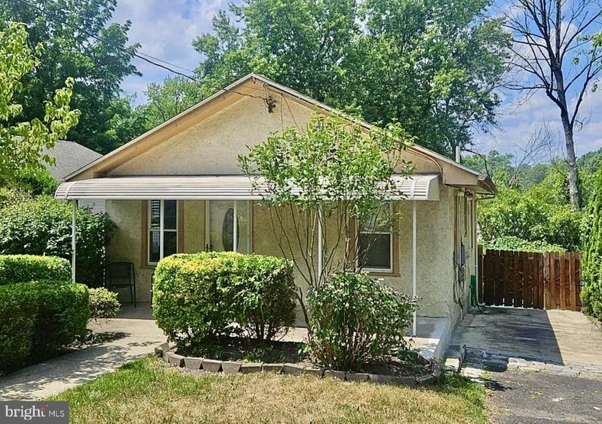 Welcome to this beautifully maintained home nestled on a quiet, tree-lined street offering comfort, space, and thoughtful updates throughout.  Step inside to a stunning, fully renovated kitchen featuring crisp white cabinetry, sleek modern hardware, stainless steel appliances, elegant quartz countertops, and a stylish tile backsplash that ties it all together. It’s the kind of kitchen that makes morning coffee feel a little more special.

The main level offers two generously sized bedrooms and a full bathroom, providing convenient one-floor living. Downstairs, the finished basement expands the possibilities with two additional bedrooms, a second full bath, and a spacious family room perfect for guests, a home office, gym, media space, or extended living arrangements.
Step outside to a large backyard offering endless potential for entertaining, gardening, or simply unwinding in your own private outdoor yard.
If you’re looking for move-in-ready, functional space, and a peaceful setting all in one  this home checks every box.