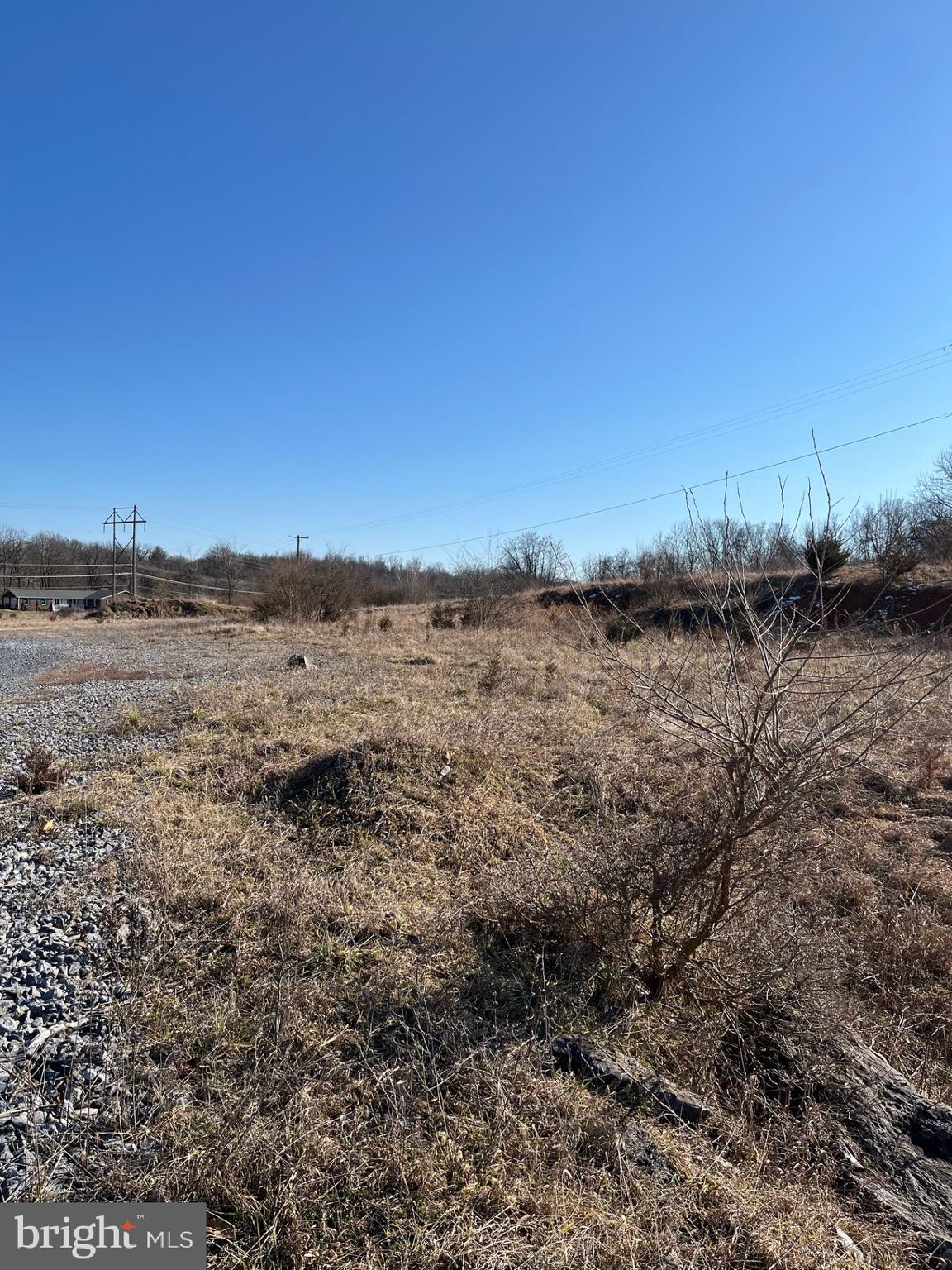 Great Commercial lot right next to Morgan Grove Park containing almost 3 acres with Kearneysville Pike Road frontage. There are endless possibilities with this lot. Public water and sewer is right up the street. Come take a look.