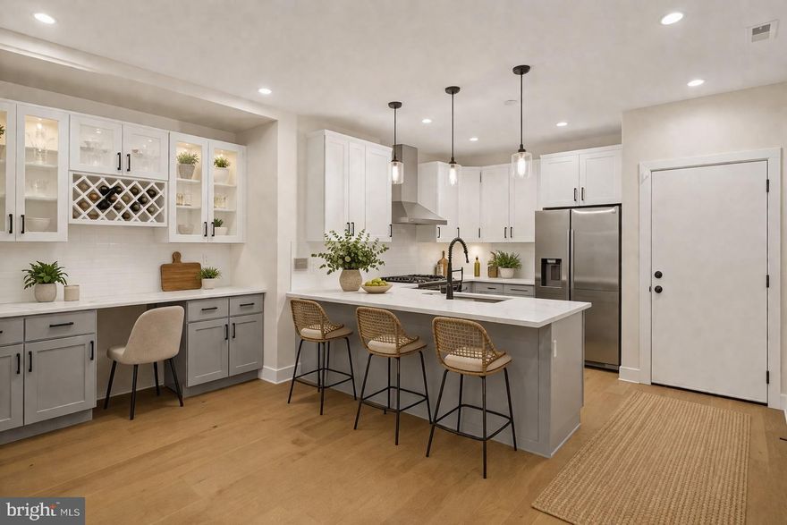 1224 N 26th Street, Unit E1 offers an easy, well-balanced layout with upgraded finishes and modern character that can't be beat. The 2400 sq ft tri-level unit includes three notably large bedrooms and 3 beautifully finished and thoughtfully designed bathrooms. The living room feels comfortable and is completely light drenched. The dedicated dining room with built-ins add both character and function - and compliment the unit's spacious kitchen that is ideal for all your cooking and entertaining needs.

An expansive deck extends the living space outdoors and allows for true everyday use—morning coffee, open-air dining, and easy entertaining. With 1 car garaged parking and approximately 6 years remaining on the tax abatement, the home pairs elevated interiors with meaningful long-term value. Not to mention its location to a number of transit options and local favs like the Lucky Goat Coffee House! Make your apt today!