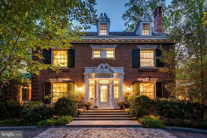 Built in 1928, this stately Georgian home is one of the true “Grande Dames” of Chevy Chase, DC. This beautiful residence is set on a gorgeous and private 1/2 acre lot, designed by the master garden designer, Lila Fendrick. The level front lawn is screened from the street and framed by a horseshoe driveway, allowing ample off-street parking. The formality of the front yard gives way to stone walls and beautiful gardens surrounding the backyard swimming pool.

Fully renovated in 2006, the interior of this 8,200 sqft seven bedroom, four full- and two half- bath home is a marriage of the best of old and new, with an elevator servicing three of its four floors and spectacular spaces for entertaining. Seemingly from a bygone era, the gracious scale and careful attention to detail is apparent the moment you enter, from the high ceilings and generous proportions of the entry foyer and its original light fixture, expansive front and back parlors, to the lovely formal dining room, sun-filled solarium and porte cochere. The kitchen is graced by a fully functional 1936 Chambers Imperial stove, which functions as a centerpiece (and conversation piece) for the entire home. The sunny breakfast room and quiet tree-shaded porch, overlooking the lawn of the Bulgarian Chancery next door, are wonderful retreats in any season.

The second level has a lovely primary bedroom, two additional bedrooms, secluded office and a breathtaking library which surveys the rear garden. The third level has two bedrooms and a view overlooking the entire neighborhood, with the tower of the Washington Cathedral visible on a winter’s day. 

The lower level, with its entertainment center, wet bar, pool table and exercise room, opens to the lovely trellis room and generous pool terrace. Like the entry level, this area is also designed for gracious and comfortable entertaining. Caterers can gain easy access to the backyard through the private car gate and driveway extension.

Modern updates to the property include a full hard-wired security system, an operational battery backup system, and integrated intercoms throughout, combined with a surprising amount of storage for a property of its age. Not only is the home remarkable, but the neighborhood as well. One block from Lafayette Elementary School’s tennis courts, splash park and marvelous playgrounds, and a short walk to the Broad Branch Market and the shops and restaurants of Connecticut Avenue. Chevy Chase, DC is a village within the city, and this wonderful block of Rittenhouse Street is a destination each Halloween for hundreds of children who know it as a prime trick or treat location.

This unique house has only been available to the market a few times in its long history. Don’t miss your chance to call this special residence your home!