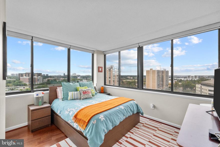 Welcome to a rare opportunity to own a stunning combined penthouse unit (1515 + 1517) with over 2,000sqft of living space at The Olympus, where sweeping panoramic sunrise views, daytime glimpses of the U.S. Capitol, and twinkling National Harbor lights by night create an ever-changing backdrop for your daily life. From your private balconies, enjoy front-row seats to the D.C. and Mount Vernon fireworks, making every holiday unforgettable. Inside, over $35,000 in upgrades reflect thoughtful attention to detail and comfort, including new energy-efficient windows and sliding glass doors with sleek motorized blinds, upgraded Leviton electrical panels, a new air handler with emergency heat, and all-new water disconnect valves across three air handler closets. Even everyday living feels elevated thanks to a completely upgraded laundry room featuring a brand-new LG WashTower. Spacious, light-filled, and perched above the city, this beautifully curated penthouse offers not just a home, but a lifestyle — luxurious, effortless, and undeniably special. Residents enjoy access to a long list of building amenities, including a fitness center, community room, sauna, outdoor pool, tennis courts, a fenced dog-run, EV charging stations, and paths that lead to Stevenson Park. All utilities (except phone, internet, and cable) are included in the condo fee. Ideally located near major commuter routes and just minutes from the best of Alexandria—shopping, dining, entertainment, and more! Conveniently located with easy access to I-395, Van Dorn Metro, and the DASH bus system, making commuting a breeze. Located near the rapidly growing West End Alexandria and the new Inova Alexandria Hospital, this property offers excellent potential for future growth and value appreciation. Mortgage savings may be available for buyers of this listing.