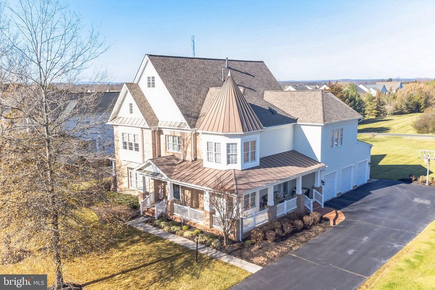 Welcome to this luxurious family home in the highly sought-after Village of Waxpool. Your future home offers 6,652 sq ft of living space, with 5 Bedrooms and 5.5 Bathrooms. A covered wraparound front porch invites you to a grand entry with a curved staircase. Make your way across the gorgeous Brazilian cherry Bellawood hardwood floors to a formal Living Room with double French doors to a patio, a formal Dining Room with built-in hutch/butler’s pantry, a Great Room with cozy fireplace, and a gourmet eat-in Kitchen. The Kitchen features stunning Quartzite countertops with decorative tile backsplash, high end stainless-steel appliances with a gas top, and large center island with additional seating. Retire to the Great Room and cozy up in front of the gas fireplace, or settle in with a book in the sunroom. Separate your work and home life in the private main-floor Study. Hardwood floors continue upstairs, where you’ll find 5 Bedrooms, each with en suite, including 2 connected by a Jack-and-Jill bathroom. The luxurious Primary Suite features a private spa-like bathroom with dual sinks and sit-down vanity. The Laundry Room is conveniently located upstairs near the bedrooms. A fully-finished walk-up basement with a full wet bar is ready for your favorite game tables and movie nights!  There are 2 bonus rooms, which can be used as non-conforming bedrooms, exercise rooms or another in-home office. The secluded backyard offers picturesque views reminiscent of a golf course, creating a private retreat just outside your door! Located about 2 miles to Ashburn Metro, closest to Broadlands and Brambleton, 267, hwy 7 for easy commutes! Steps form Beaverdam Reservoir, which offers a kayak boat launch, walking trails, and more! Don’t miss this elegant family home!"