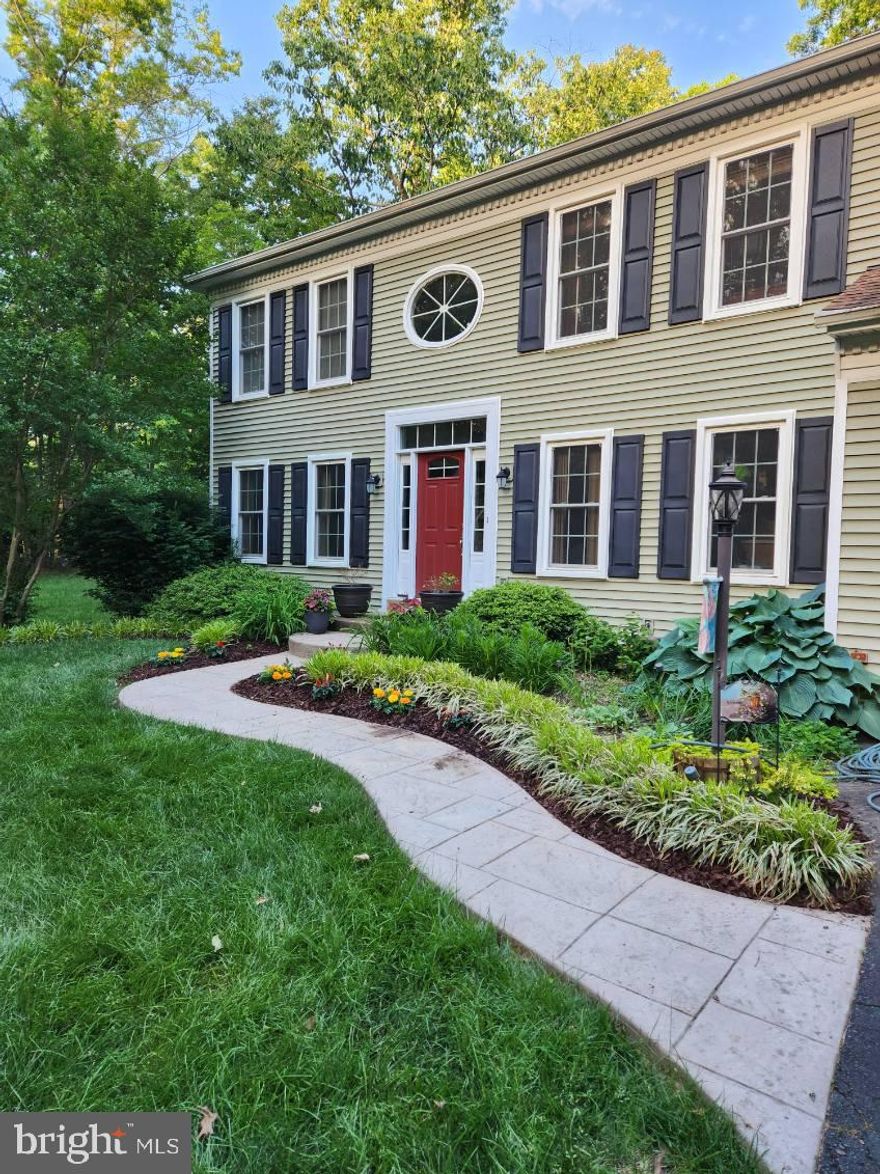 Beautifully updated and move-in ready, this home features a chef’s kitchen, sunken family room with fireplace, and updated bathrooms throughout. Major upgrades include roof, siding, HVAC, windows, garage door, doors, hot-water heater plus brand new carpet and fresh paint. It's truly move-in ready.

The sunken family room opens to a private, fully fenced, tree-lined backyard with a large deck, expansive patio, and hot tub—perfect for entertaining, BBQs, and everyday enjoyment, with plenty of space left to run and play. Long driveway offers ample parking.

Located in a no HOA community, with optional access ($175/year) to Dugan Park, featuring a pavilion, Occoquan River access, boat launch, and dock—ideal for boating, fishing, kayaking, and paddleboarding.