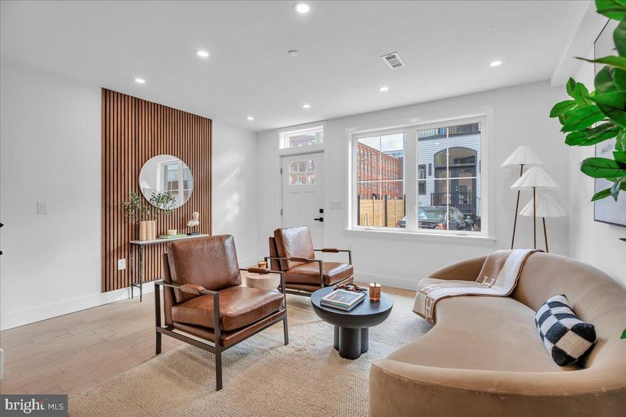 Just COMPLETED!  
1146 N Galloway Street is a Premium New Construction home in Northern Liberties offering approximately 2,550 sq. ft. of finished space, including a fully finished basement. This modern residence features 5 bedrooms, 3 full bathrooms, and 1 half bath. White oak flooring runs throughout the home, creating a warm and timeless foundation. The kitchen is a true centerpiece, showcasing Thermador appliances, gorgeous granite countertops, and sleek cabinetry with contemporary finishes. The third floor is dedicated to a light filled primary suite with a double-vanity bathroom, soaking tub, and walk-in closet. A private rooftop deck provides sweeping skyline views, perfect for entertaining or unwinding in your own urban retreat. Additional features include dual-zone HVAC, 10 year tax abatement, 1-year builder warranty, 1 year of paid parking .  A rare opportunity to own a brand new luxurious, well-appointed home on a quiet residential block  in one of Philadelphia’s most vibrant neighborhoods. Full 10 year TAX Abatement !