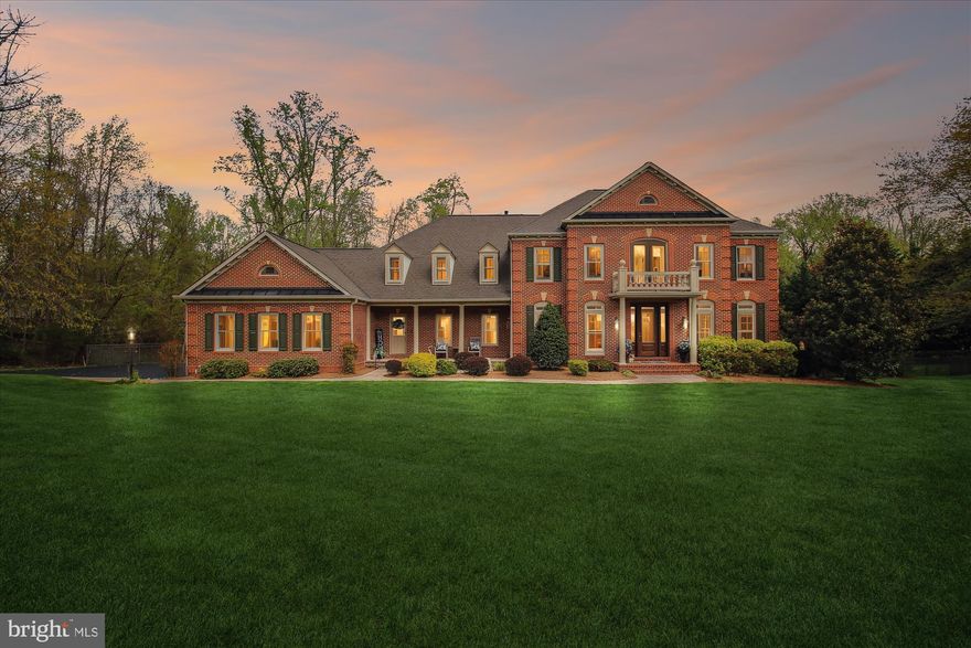 Located in the heart of Davidsonville this well appointed home is ready to move into. The  lush green grass and extensive landscape showcase this rolling property to allow for a walkout featuring a private rear setting to overlook the palatial rear yard with huge entertaining area and deck which is directly beside your pool. The home itself features 5 beds with 5/2 baths. From the moment you enter the home every room welcomes you. The recent gourmet kitchen features WOLF and SubZero appliances with beautiful cherry cabinetry. Built in fridge and freezer along with a sizable island and built in breakfast island / table. No expense was spared on this home. The primary suite is huge with a fireplace in the sitting room and plenty of space in the custom walk in closet. All upper bedrooms have their own bathroom and overlook a mezzanine area looking into the foyer past the beautiful chandelier gracing the entry.  There are 2 flights of stair for the upper level which ease the flow through the home and access to the kitcen or the foyer. Once on the main level the sunken living area has its own fireplace with expansive windows to look out across the rear yard to the trees behind. Casually walk out to one of the best entertaining areas you will find. The raised deck has enough space for large events and also creates a Groto like setting below on the patio which leads to the pool area. All of this is situated in a fenced rear yard. There is even a man cave / she shed which is large enough to do whatever you might want to do. The lower level is also completely finished with the great room, a billiards room, game room, bonus room, craft /storage room, mechanical room all of which walk out to the rear patio area.  Even the garage has an epoxy floor with  a wall mounted  organizing system. A true entertainers paradise. Bring you client and strong offers. This one is a true unicorn.