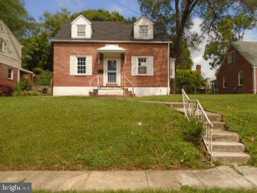 Nice size Cape Cod on Tree lined street. Open floor plan on main level. Fireplace in living room. Separate dining room with built ins. Kitchen has table space. Family room off kitchen. Powder room on main level. Upper level has 3 bedrooms and full bath. Lower level is improved and has plenty of room for storage.   Spacious rear yard is partially fenced and long driveway for off street parking. Easy access to downtown and 695. Close to schools and shopping. Owner occupants only 1st 15 days . Investors can submit offer on 7/16 if still available.