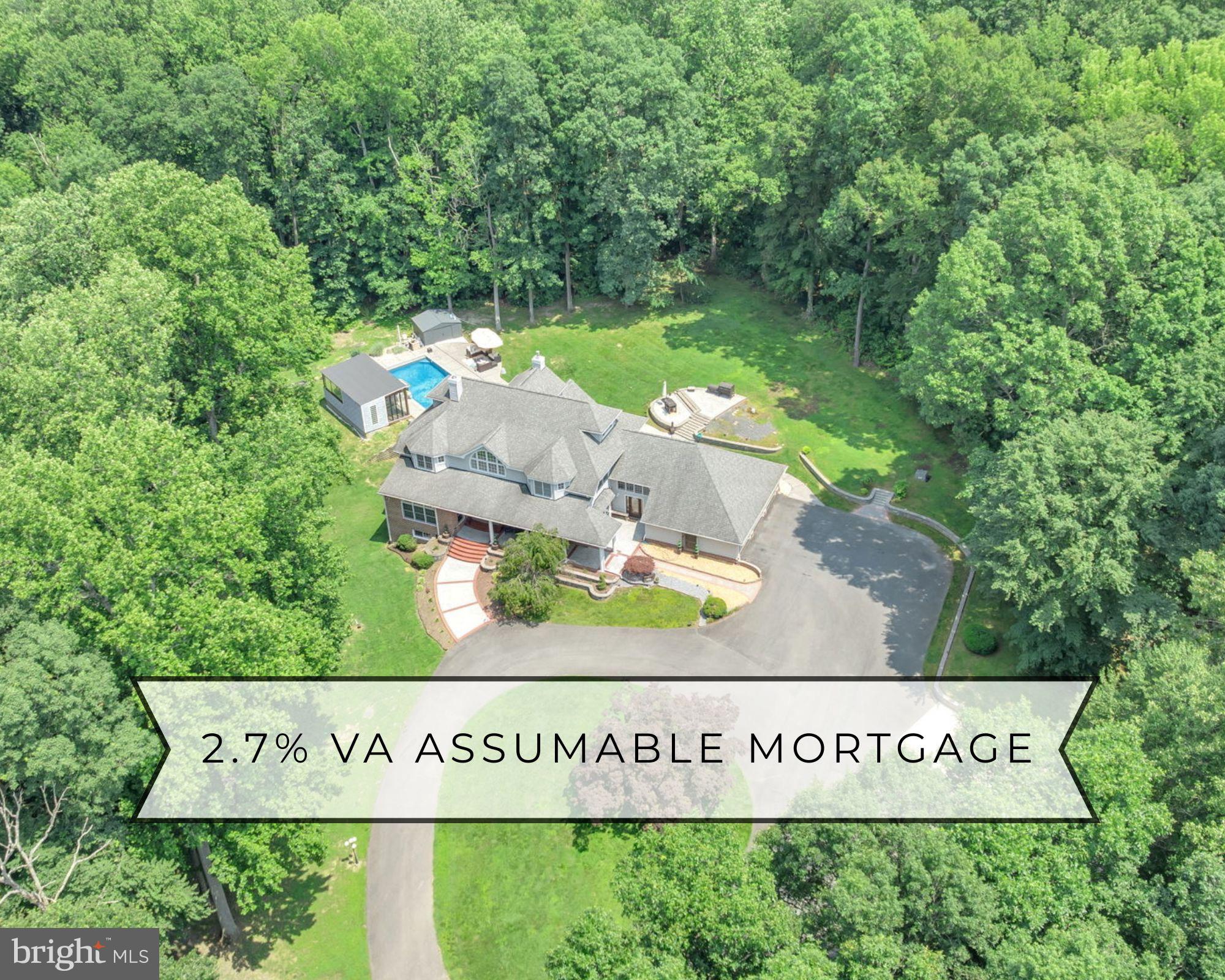 This exceptional property also comes with a rare and highly valuable opportunity: a VA assumable mortgage at an incredibly low 2.7% interest rate. With a monthly payment of just $3,832.89! This VA loan offers significant savings compared to current market rates. The loan with Carrington has a second loan product to cover funds due at closing. Even better, the listing agent is highly experienced with assumable loans and can expertly guide qualified buyers and agents through the process. Don’t miss the chance to secure this luxury home and one of the best financing options available today.
Welcome to 2850 Dunleigh Drive in Dunkirk, Maryland—an extraordinary custom-built estate nestled within the exclusive Dunleigh community in northern Calvert County. From the moment you pass through the private gated entrance and follow the lamp-lit driveway, this home exudes privacy, luxury, and high-end living. Every detail has been thoughtfully designed and meticulously updated with top-of-the-line finishes and smart home technology throughout.
The heart of the home is a showstopping, state-of-the-art glass wall wine cellar and bar in the fully finished basement, accented by a decorative feature wall and a travertine stone fireplace—perfect for entertaining or unwinding in style. The primary suite is a true sanctuary, boasting a newly renovated spa-style bathroom with heated floors, granite countertops, custom cabinetry, a double vanity, and a steam shower complete with five showerheads, built-in music, and a natural rock floor designed to massage your feet. A bidet adds an extra touch of luxury, while barn doors, a decorative fireplace hearth with TV mount, and dual ceiling fans complete the master bedroom’s upscale feel.
Designed for seamless modern living, the entire home is equipped with integrated smart technology, including thermostats, lighting, and garage door openers for both the attached and detached garages. The gourmet kitchen features Thermador and JennAir appliances, granite countertops, and a built-in wine refrigerator, offering a functional yet elegant space for culinary adventures.
One of the home’s most breathtaking features is the sunroom, which overlooks a backyard oasis that truly feels like a private resort. The outdoor space includes a sparkling pool with a grotto waterfall, a pergola with fan and lighting, a pool house with full bath, a hot tub with custom glass doors, an outdoor storage shed, and a separate 3-car detached garage. There's also an RV pad with hookup—perfect for guests or road trip prep.
With six fireplaces, two newer HVAC units (one 7 years old, one 4 years and a roof less than 10 years old, this home blends elegance and efficiency. And with a prime location offering quick access to Annapolis, Washington D.C., Andrews AFB, and other regional government and military installations, 2850 Dunleigh Drive offers the ideal blend of luxury, privacy, and convenience. This isn’t just a home—it’s a lifestyle.