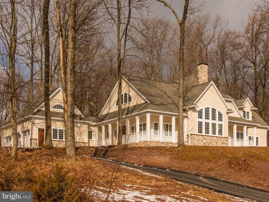 Newly completed, exclusive custom designed home in a majestic setting. Breathtaking great room with vaulted ceiling, wall of windows and floor to ceiling fireplace. The hearth room takes advantage of the beautiful wooded lot to the rear. First floor master suite with elegant bath and separate dressing area. Open kitchen with dual islands, huge finished lower level with kitchenette/bar and fireplace. 24 additional lots available.