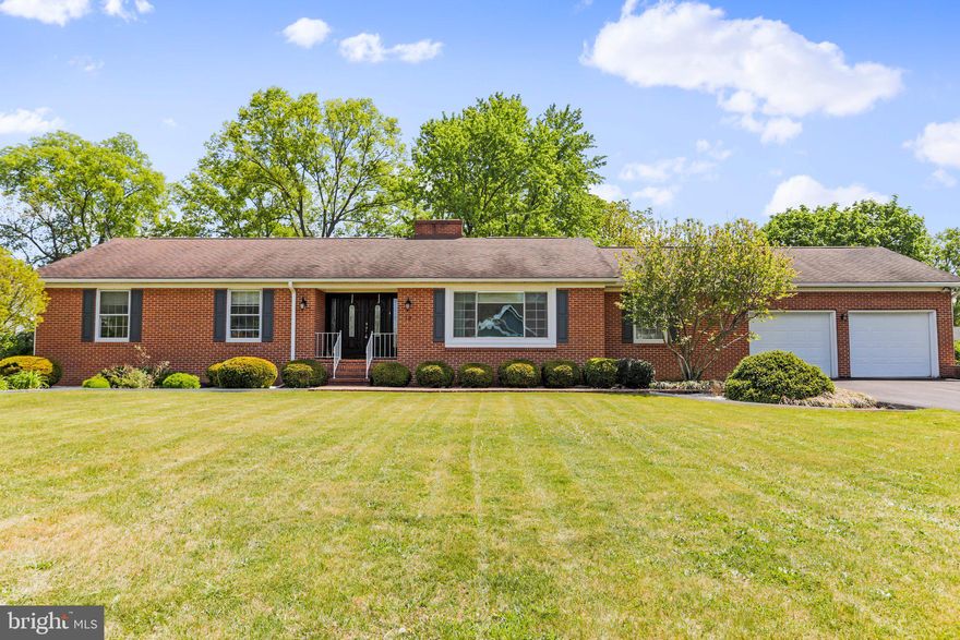 ALL BRICK RANCHER WITH EXTRA LOT - WELL KEPT HOME WITH LOVELY SUN ROOM ADDITION WITH CATHEDRAL CEILINGS, EAT-IN KITCHEN WITH NEWER APPLIANCES, BREAKFAST NOOK, ADJACENT FAMILY ROOM WITH WOOD-BURNING FIREPLACE , FORMAL LIVING & DINING ROOMS & MAIN LEVEL LAUNDRY.   FINISHED BASESMENT HAS REC ROOM WITH 2ND FIREPLACE, A FULL BATH & OPTIONAL 4TH BEDROOM, & HUGE STORAGE ROOM!   MANY UPDATES INCLUDING NEWER HEAT PUMP, NEWER KITCHEN APPLIANCES, DOUBLE GARAGE & PLENTY PARKING WITH ADDITIONAL 50' PARKING PAD.  SHOWS NICELY.    HOME SWEET HOME...AWAITING YOUR INSPECTION.