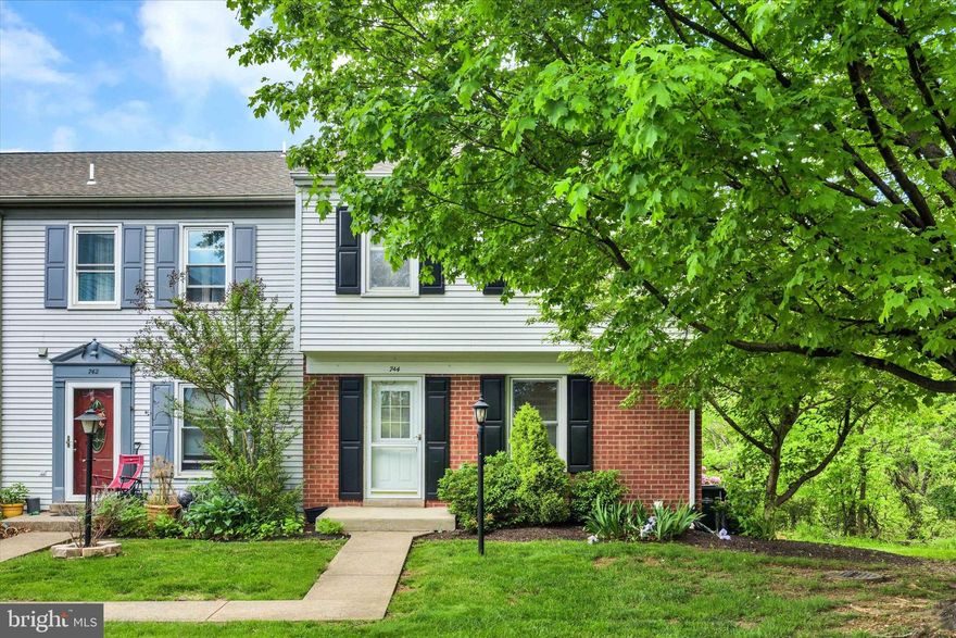 Welcome to this lovely end-unit townhome nestled on a corner lot in the desirable Allenview community! Offering over 1,796 square feet of finished living space, this home is filled with wonderful features throughout. Step inside to the foyer which leads into the spacious combination living and dining area with carpet, window treatments, built-ins and a wood-burning fireplace, a great space for entertaining. The eat-in kitchen offers tile floors, ceiling fan, quartz countertops, tile backsplash and a pantry for plenty of storage. Upstairs, you'll find three generously sized bedrooms with spacious closets and two full bathrooms. The partially finished walk-out basement provides a flexible bonus space with carpet, chair rail and laundry room with utility sink and shelving. Enjoy outdoor living on the large deck and patio space that overlooks a cleared backyard with peaceful wooded views. Conveniently located near shopping, dining, and entertainment. Newer H2O heater in 2024. A joy to own!