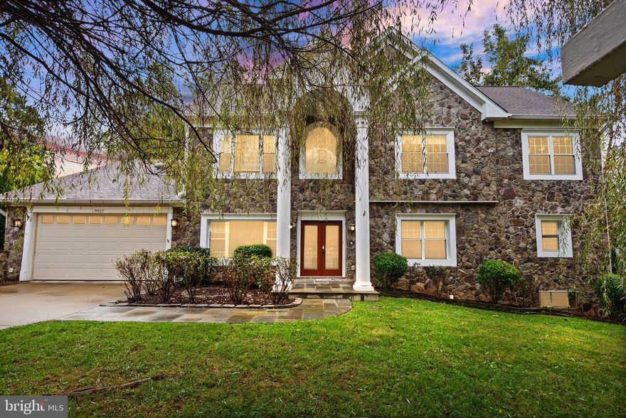 Experience timeless luxury and exceptional craftsmanship in thisexquisite six-bedroom, five-and-a-half-bath custom-built home, ideally located in the heart of Fairfax City, with the opportunity to assume a 2.75% mortgage rate!

The main level welcomes you with gleaming hardwood floors, elegant tray ceilings, and refined custom millwork. A gracious living room greets you to the left and a formal dining room greets you to the right, flowing seamlessly into a private home office featuring a coffered ceiling, rich wood detailing, and French doors that provide quiet focus and privacy—ideal for today’s work-from-home lifestyle. The spacious family room, with built-in shelving and a gas fireplace, connects effortlessly to the gourmet kitchen, a chef’s dream boasting top-of-the-line stainless steel appliances, granite countertops, a bright breakfast area, and a custom-built island with integrated wine storage. Two expansive decks extend the living space outdoors—perfect for entertaining or relaxed gatherings. A main-level bedroom with an en suite bath offers flexibility for guests or multigenerational living, while a stylish powder room completes the main level with sophistication and convenience.

Upstairs, the luxurious primary suite is a true retreat, showcasing a tray ceiling, cozy sitting area, gas fireplace, and two custom walk-in closets plus a spacious attached room ideal for a third closet, dressing area, or private home office. The spa-inspired primary bath offers a sanctuary of relaxation with a gas fireplace, custom shower, two-person jetted tub, dual vanities, and built-in televisions for added indulgence. Three additional spacious bedrooms complete the upper level, along with a striking spiral staircase that leads to a private home theater featuring three rows of tiered seating—a true cinematic experience within the comfort of home.

The lower level is designed for recreation and rejuvenation, featuring recently replaced luxury vinyl plank (LVP) flooring, a large rec room with a fireplace, a custom wet bar, the home's sixth bedroom and full bath, and a dedicated home gym complete with an infrared sauna. From here, walk out to a beautifully designed stone patio with a built-in fire pit overlooking the serene, private backyard.

Perfectly positioned for convenience, this exceptional residence is just moments from the Army Navy Country Club and within easy reach of major commuter routes including I-66, Route 50, and Route 123. Both Dulles International Airport and Reagan National Airport are less than 30 minutes away, offering seamless access for business or leisure travel.

An extraordinary opportunity to enjoy refined living close to Fairfax City’s charming shops, restaurants, and schools—9917 Colony Road blends sophistication, comfort, and modern convenience in one perfect package.