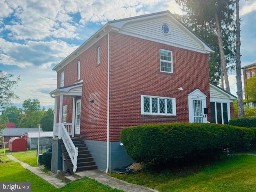Charming Historic Home in Elkins, WV. Discover the perfect blend of modern elegance and historic charm in this beautifully remodeled brick two-story house, nestled in the heart of Elkins. Sitting on a desirable corner lot with two spacious lots total, this property features a fully fenced in yard, ideal for pets or outdoor gatherings. Step inside to find a stunning remodeled kitchen that serves as the heart of the home, perfect for culinary enthusiasts and entertaining guests. Relax in the inviting screened-in sitting porch, where you can enjoy your morning coffee or unwind in the evenings. On those cold mornings, relax in the living room where the wood stove will keep you warm and cozy all day long. With a full basement offering ample storage and potential for customization, this home is both functional and stylish. Located just a short distance from the hospital, it's an ideal choice for medical professionals, while proximity to downtown amenities ensures convenience at your fingertips. Don’t miss the opportunity to own a piece of Elkins history—schedule your private showing today!