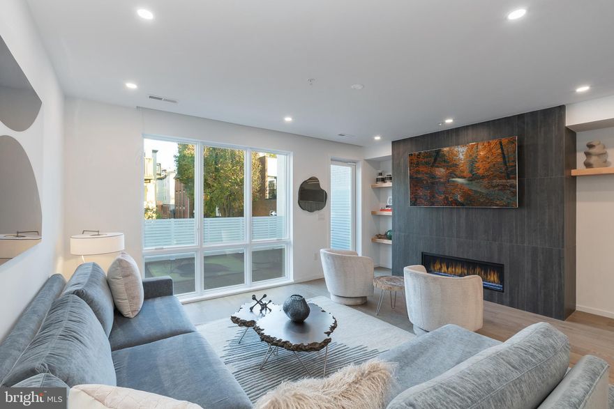 Moderna @ Rittenhouse. Possibly the last new townhomes to be built in Rittenhouse with the full 10 years of tax abatement. These eight revolutionary new homes have been designed by renowned architect Shimi Zaken of Atrium design group. Only a few remain. Each home has a 2-car garage, 6-stop elevator, 10 year tax abatement, and approximately 4,898 square feet of living space w/ amazing luxuries throughout. Each home has four bedrooms plus two additional rooms that can be used as bedrooms or offices. Moderna homes come equipped with Control-4 smart home systems included, 3-outdoor decks, roof deck with skyline views and optional plunge pool and outdoor kitchen. the entertaining level has a spectacular chefs kitchen with Wolf/Sub-zero appliances package, quartz counters with 2cm eased edges, and custom cabinetry with soft close hinges. the living room has partially double height ceilings, access to  a large deck, and a breathtaking staircase with custom railings. Moderna homes have a finished lower level with media room, wet bar and beverage center, custom closets throughout, four zones of energy efficient HVAC system, and much much more. Located on one of the most desirable blocks in the neighborhood, convenient to the Lombard Swim club, Rittenhouse Square Park, and every wonderful amenity that makes Rittenhouse the most sought after neighborhood in Center City. New Construction townhomes do not become available often in Rittenhouse! Moderna is located within the Albert M Greenfield School catchment. Some additional features include: Custom pivot hinge from door and magnificent front facade, 4 full bathrooms with custom tile work, frame-less glass showers, modern vanities with quartz counters, 3 half baths, full size laundry room with whirlpool washer and dryer included and stainless steel laundry sink, wood clad windows throughout, solid core interior doors, interior metal railing system, upgraded extra thick drywall, upgraded energy efficient hot water heater, alarm system, sprinkler system, designer lighting and plumbing fixtures and a world class design. Estimated Square footage total includes above grade space and below grade space and is estimated. It is the responsibility of the buyer to verify square footage and taxes.