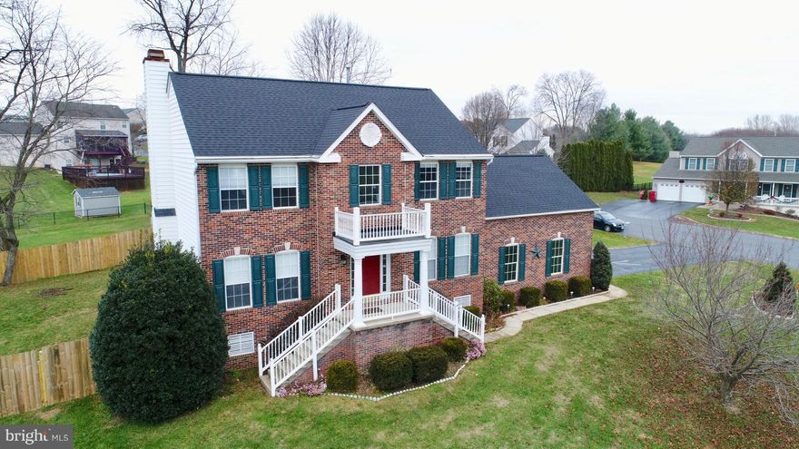 Gorgeous 3BR 2.5 Bath Colonial on corner lot! Brick front with side load 2 car garage with wifi operated garage door opener. 2 Story Foyer. Gourmet Kitchen with granite, Stainless appliances, and island with Breakfast Nook. FamilyRoom off of kitchen with Gas Fireplace. Upper level boasts a grand Master Suite complete with renovated luxury bath and huge walk-in closet! This home boasts tons of upgrades completed in 2018-new carpet, LED lights, plumbing fixtures,paint, reverse osmosis water filtration system, roof, and master bath. New Kitchen and HVAC in 2017! Privacy fenced rear yard with storage building. Unfinished Lower level. Located near parks, hospital and Commuter Routes. A MUST SEE!!