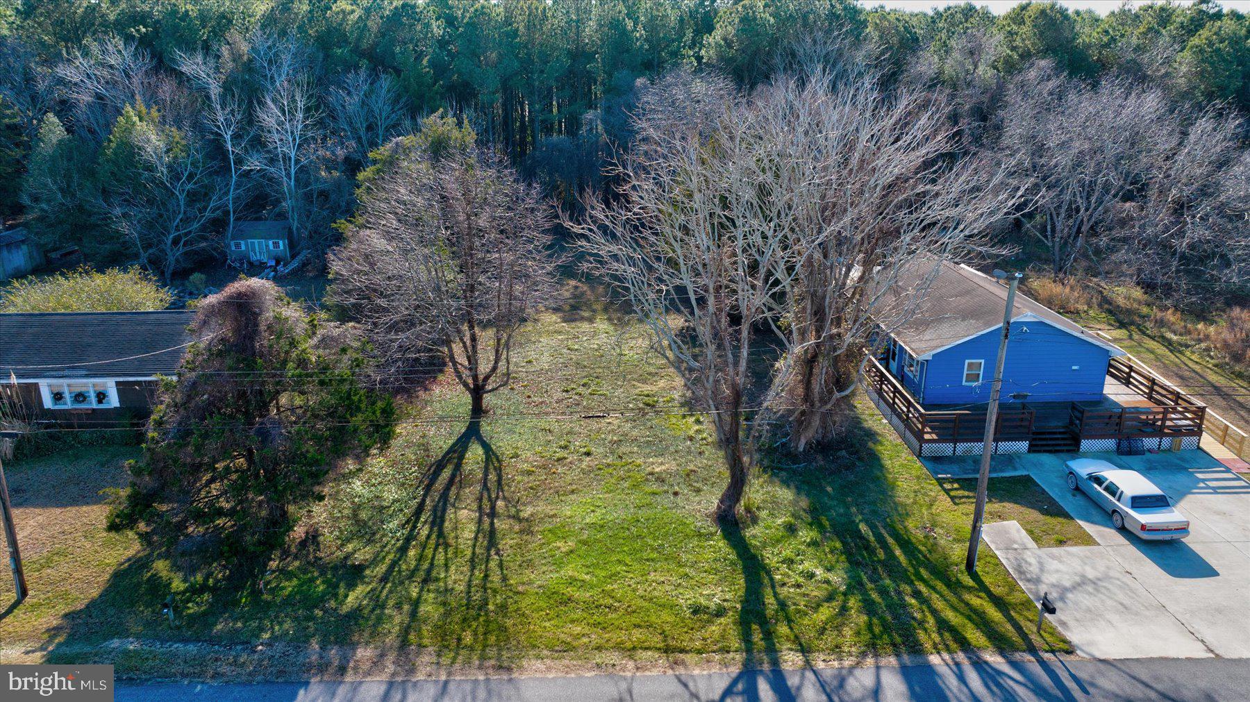 Discover the perfect opportunity to create your ideal home at 12524 Salisbury Rd, Ocean City, MD 21842. This 0.33-acre/14,250 square feet with an 8,100 square feet building envelop as noted on the survey supplied in both the pictures and the MLS documents. The lot is situated in the highly desirable West Ocean City area, Cape isle of White. The lot location offers unbeatable convenience as it is just around the corner from Ocean City Elementary School and close to all of the amenities offered in the West OC area.
Tucked away on a quiet street, this property backs up to a wooded area, offering privacy and a peaceful backdrop. Located just minutes from Ocean City's beaches, iconic boardwalk, and Assateague Island, this lot places you close to everything while still providing a tranquil retreat.
With a large building envelope, public sewer hookup, and no HOA or builder requirements, you have the freedom to design and build your dream home exactly as you envision it. Don't miss this rare opportunity to own a prime piece of land in West Ocean City!