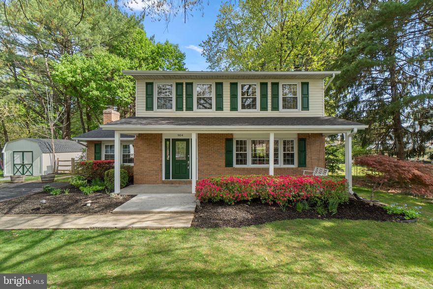 Welcome to 904 Caren Drive, a beautifully maintained 4-bedroom, 2.5-bath home nestled in the desirable Carroll Square neighborhood of Eldersburg. With thoughtful updates throughout and true move-in-ready condition, this home offers the perfect blend of comfort, functionality, and everyday living.
From the moment you arrive, the charming covered front porch sets the tone—an inviting space to enjoy quiet mornings or unwind in the evenings. Step inside to a bright and welcoming main level featuring spacious living and dining rooms that provide the perfect setting for both everyday living and entertaining alike, The kitchen has been tastefully updated with granite countertops, stainless steel appliances, and select glass-front cabinetry, offering both style and functionality. An adjacent informal dining area provides a convenient space for casual meals. Just beyond, the family room is warm and inviting, highlighted by built-ins that frame the fireplace—creating a comfortable space to gather and relax. From the family room, step outside to the paver patio and into one of the home’s standout features—the expansive, level backyard. Whether you’re hosting gatherings, creating a garden, or simply enjoying outdoor space, this yard offers endless possibilities for both relaxation and entertaining. A conveniently located powder room completes the main level. Upstairs, you’ll find the primary suite with a private en-suite bath, along with three additional well-sized bedrooms and a full hall bathroom, providing flexibility for family, guests, or home office needs. The lower level adds additional living space with a finished recreation room, ideal for a playroom, media room, or home gym, along with a utility/workshop area that offers excellent storage and functionality.  **  Recent updates include a new roof (2024) and water heater (2025), adding peace of mind and long-term value. Ideally located in Eldersburg, this home offers access to a wide range of amenities that make the area so desirable. Enjoy nearby Freedom Park, Piney Run Park, and miles of walking and biking trails, along with recreational facilities, playgrounds, and open green space. Just minutes away, downtown Sykesville—voted one of “America’s Coolest Small Towns”—offers charming shops, local restaurants, coffee spots, and year-round community events. Everyday conveniences including grocery stores, gyms, and retail shopping are all close by. For commuters, the location provides easy access to Route 26, Route 32, and I-70, allowing for convenient travel to Baltimore, Columbia, and surrounding areas.    A perfect combination of updates, space, and location—904 Caren Drive is ready to welcome you home.
