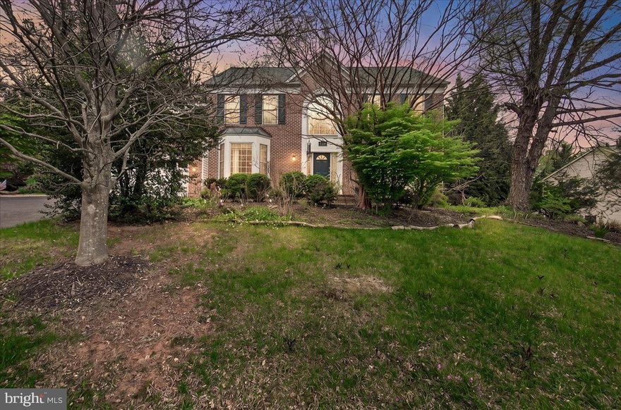 Nestled in the highly sought-after community of Ijamsville, this expansive center-hall colonial offers a rare combination of traditional elegance and staggering scale. The home’s "light and bright" energy is unmistakable, highlighted by a massive floor plan that feels airy and open despite its classic roots. The main level is designed for both daily life and grand-scale entertaining, featuring a large kitchen with maple cabinetry, dual pantries, and Corian countertops that flows into a breakfast area and a family room anchored by a cozy gas fireplace. Step through the family room doors to discover the home’s true outdoor sanctuary: a sprawling, nearly new composite deck overlooking a private backdrop of mature trees. Below, an oversized concrete patio extends well beyond the deck’s footprint, offering a dedicated space for basketball or outdoor gatherings. With recent updates including a newer roof (5–7 years) and a newer water heater and dishwasher, the heavy lifting on major systems is well underway, leaving you the perfect opportunity to refinish the hardwoods and paint to refresh the spaces to your exact taste!

The upper level is defined by a primary suite that must be seen to be believed; featuring a massive bonus room roughly the size of the two-car garage, this "apartment-sized" retreat includes a walk-in closet and a spa-like en-suite with a soaking tub and separate shower. Three additional spacious bedrooms and a convenient main-floor laundry room ensure plenty of space for everyone. The finished walk-out basement further expands the living area with a giant recreation room—complete with its own gas fireplace and sleek black built-ins—plus a fifth bedroom, full bath, and two dedicated storage rooms. Situated in a prime location for DC and Frederick commuters, this home represents a significant value opportunity. The sheer square footage and premium features like the side-personnel garage door and expansive lot make this a solid investment in one of Maryland’s most desirable zip codes. Bring your vision and turn this light-filled giant into your forever masterpiece.  --  Uploaded photo has been enhanced with AI to show trees in bloom and more realistic coloring.