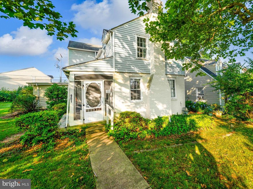 Welcome to this charming 1945-built fixer-upper located on a large corner lot. As you step inside, you'll be greeted by beautiful wood floors that exude warmth and elegance throughout the majority of the living spaces. With gas heat and air conditioning, you can enjoy optimal comfort regardless of the weather outside.

The main level of the home features a spacious living room with a cozy fireplace, perfect for creating a warm and inviting atmosphere. Adjacent to the living room, there is a formal dining room, ideal for hosting gatherings and special occasions. The kitchen, while awaiting an update, holds great potential to be transformed into a personalized culinary haven tailored to your tastes.

Upstairs, you'll find three bedrooms and a recently remodeled bathroom designed with handicap accessibility in mind. This thoughtful renovation ensures convenience and ease of use for all residents. Additionally, there is a powder room on the main level, providing added convenience for guests and everyday use.

Situated on a generous corner lot, this property offers ample space for outdoor activities and gardening. The mature trees on the lot enhance the natural beauty and provide pleasant shade during hot summer days. At the back of the lot, and attached to the home, a garage provides convenient storage for vehicles and additional belongings. Notably, the property had a driveway that used to connect Pennsylvania Avenue to the garage. The daylight basement  has tons of space for storage, has a washer and a dryer and is accessible from inside and outside.

To further enhance your enjoyment of the outdoors, the home features a delightful screened porch. This charming space allows you to relax and soak in the serene surroundings without being bothered by insects.

Embrace the opportunity to transform this home into your dream space, where you can combine its charming elements with your personal style and vision.