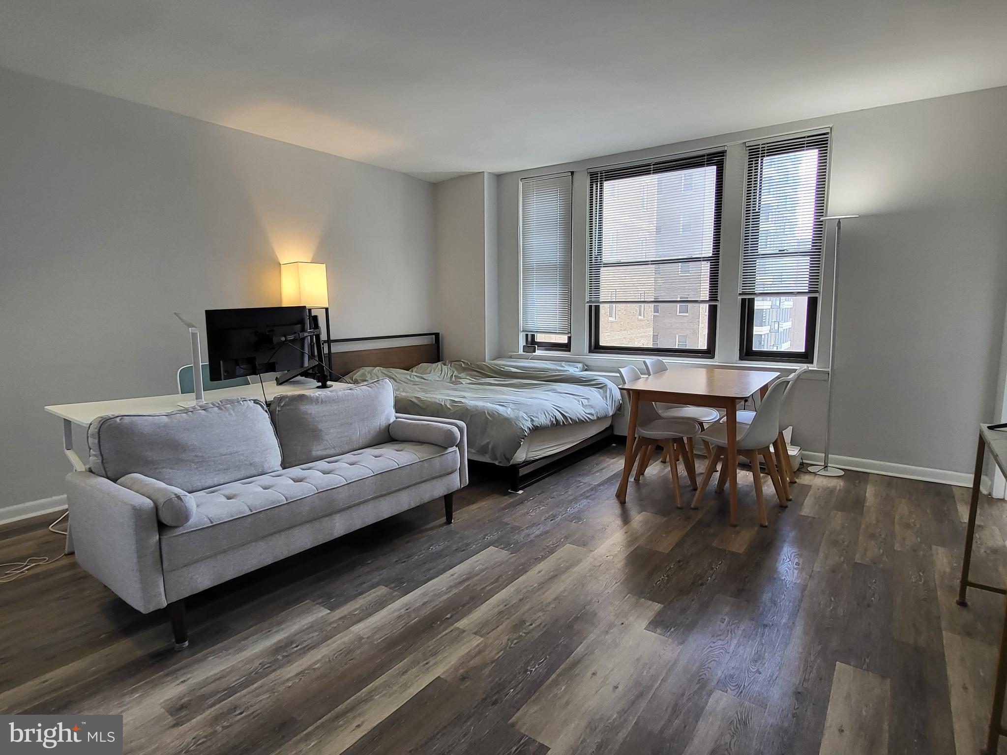 Sun-soaked studio on a high floor of The Wellington on Rittenhouse Square! The unit has been updated to feature brand vinyl floors and fully renovated kitchen and bathroom. The generously sized living area offers excellent natural light and closet space. The separate modern kitchen features sleek white cabinetry, quartz countertop, subway tile backsplash, and stainless steel appliances. The fully updated bathroom has a modern gray vanity, tub shower, linen closet, and upgraded tile floor. The Wellington is a pre-war apartment building located on Rittenhouse Square offering a 24 hour doorman, on-site management, and access to a nearby fitness center at 1845 Walnut.