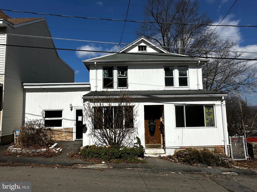 Whether you're an investor looking to add to your portfolio or a buyer looking to create your dream home, 518 Pierce may be the perfect fit! Entering through the front door, one is greeted by an enclosed porch, filled with natural light. Continuing on, you'll be welcomed by the foyer which leads onto both the living room and kitchen. The kitchen is of suitable size, perfect for meal prep. Conveniently off the kitchen are both the living room and dining area, great for entertaining. Off the dining room, the den is a great location for relaxing and hosting company, with a half bath as a bonus. The second floor is four generous sized bedrooms, as well as a full bathroom. Both the attic and both basement areas offer great storage options. The large back yard of the home is an ideal area for outdoor entertainment in the warmer months and offers desired off-street parking. Offered at $79,900, call to schedule a showing today!