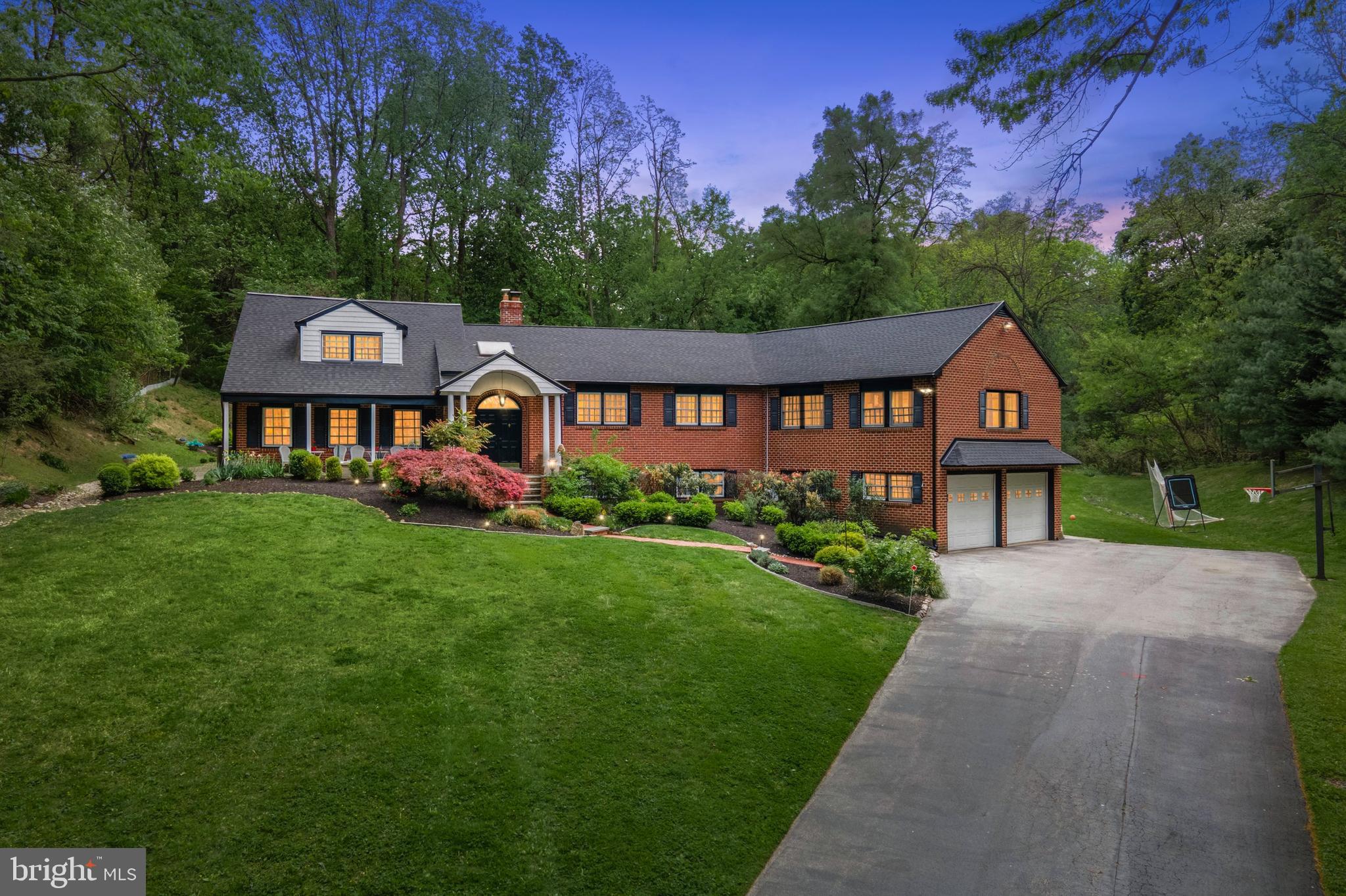 You’ve Manifested This Moment — Welcome to 1431 Sandy Circle
Set atop a picturesque knoll at the end of a quiet cul-de-sac, just 2 minutes from the Gladwyne Exit on I-76, this one-of-a-kind residence in the award-winning Lower Merion School District is available only due to seller relocation. Now is your chance to claim the dream home you’ve been waiting for!
From the moment you arrive, the charming paver walkway and lush landscaping invite you in. The flagstone front porch and stately double-door entry beneath an elegant portico set the tone for what’s inside: light-filled, refined, and exceptionally livable. A skylight-lit foyer welcomes you with warmth and style.
Just off the entry, the private home office offers French doors, custom built-ins, hardwood floors, recessed lighting, and a ceiling fan — perfect for productive days or quiet evenings. The cozy living room features plush carpet, a brick gas fireplace, and arched built-ins, adding both warmth and charm.
At the heart of the home is a gourmet kitchen designed to impress: Wolf/SubZero appliances, dual-tone cabinetry, oversized island with seating for six, two dishwashers, and a butler’s pantry overlooking the front patio. Every detail, from the built-in hood to the pot filler, has been thoughtfully chosen.
The two-story great room addition transforms the back of the home into a grand entertaining space, seamlessly extending to a fully covered outdoor kitchen with grill, oven, stovetop, dishwasher, and island — so grilling season never ends. Radiant heat floors warm up the space so you can enjoy indoor-outdoor living year round. An outdoor, covered, paver patio with lush landscaping and a soothing water feature welcomes you to relax and enjoy the rear yard and mature landscaping.
The above-grade lower level is bright and open, offering a family room, game room, home gym, and everyday essentials like a mudroom with garage access, laundry room, and powder room. Below, the sports room connects to the great room via a dramatic spiral staircase — a unique design element you won’t find elsewhere.
The upper levels boast 6 spacious bedrooms and 4 full baths, including a secluded primary suite with private screened porch, gas fireplace, two walk-in closets, and a spa-like ensuite with soaking tub, walk-in shower, dual vanities, and water closet. The second floor also includes a second ensuite bedroom plus two guest rooms with a shared bath. On the third floor, you’ll find two more bedrooms, a full bath, and a media room overlooking the great room, complete with 7-speaker surround sound, amplifier, and Savant smart control.
Designed for modern living, this home features three WiFi access points, a 5-zone Sonos sound system, and a long list of upgrades: new roof, siding, gutters, reverse osmosis system, pet-safe electric fence, sprinkler system, and three new HVAC systems.
Spanning 7,400+ square feet of luxurious, move-in-ready living space, this 6-bedroom, 4.2-bath home in one of the Main Line’s most coveted locations won’t last long. A Seamless Blend of Elegance, Comfort, and Functionality that's been lovingly maintained and only available due to relocation, this turnkey property is move-in ready and offers a lifestyle of exceptional quality and comfort. Schedule your private tour today and experience life at 1431 Sandy Circle — SHOWINGS START SAT. MAY 10th