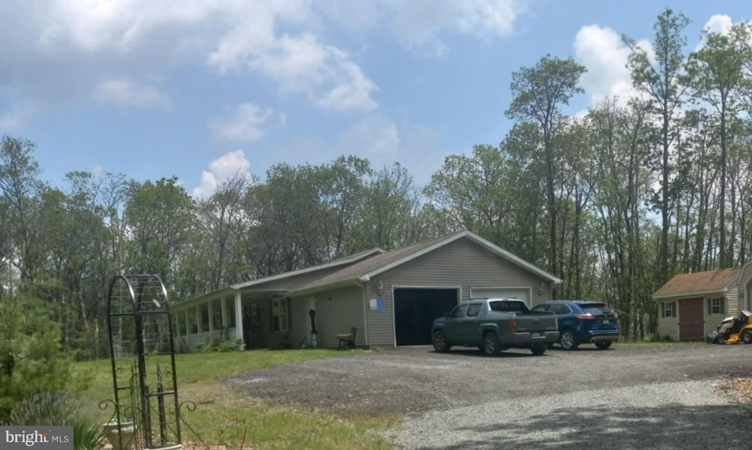 This is a well-maintained Home on one level with an attached 2 car garage, very clean, with storage space and a newly resurfaced concrete floor. If you're looking for a nice property on the mountain with privacy and room to expand or grow you may have found it in Augusta, W.V...
Included on the property is a Guest Cabin for your family, friends, or the teenager wanting their own space to come and go hiking, biking, or just hangout. Another great use for this unit might be an Air BNB to generate a little income when family and friends are not visiting.
There's a small garage/ outbuilding on the property known as Pop's Garage since Pop's use to keep his Harley Davidson and other Insignias there. Additionally, there are 2 other storage sheds that can be used for Lawn & Garden or extra storage. The yard has a lot of usable space along with nice rock outcroppings that add character to the property and lends itself well to Water Features, and additional plant beds, Add Low Voltage Lighting and really show the property off at night.
The location has good proximity to Capon Bridge where your Family and Friends can hike, canoe, kayak, and enjoy everything Capon Bridge has to offer. Romney is a short drive away for other amenities as well.
Other tools, garden equipment, and furniture are available upon request
Come on out to the Mountains of West Virginia and see why we call it Wild & Wonderful and Almost Heaven.
We think you'll agree.