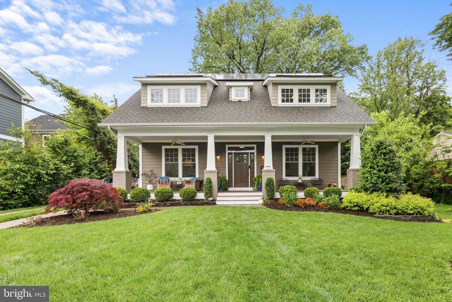 This exceptional contemporary Craftsman home, by Cottage Street in 2013, is nestled within a lush setting with professionally landscaped gardens. Offering over 4000 square feet of versatile living space across three levels, this residence embodies luxury living with its unique architectural details and high-end finishes. The gourmet kitchen boasts quality appliances, ample cabinetry, and a charming built-in bench breakfast nook with a beautiful wood top. This space seamlessly transitions into the living room, where French doors open to a large enclosed screen porch, embracing the open-concept design, perfect for entertaining and relaxation. The primary bedroom suite features a spacious walk-in closet and a spa-like marble bath, complete with heated floors for added comfort. Upstairs, you'll find wonderfully sized bedrooms accompanied by modern and pristine bathrooms. The lower level offers great space with high ceilings, featuring a stylish bath, bedroom, and ample storage. Garage parking! Seller conveys all solar panels, a whole house generator, and a car charger.