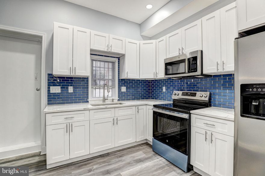 Welcome to 1602 Abbotston Street — a unique one bedroom, one and a half bathroom home offering a flexible layout and modern updates in Baltimore City. Fresh paint, recessed lighting, and LVP flooring create a clean and updated feel throughout the main level. The gourmet kitchen features stainless steel appliances, modern backsplash, ample cabinet space, and access to the rear deck — perfect for relaxing outdoors or entertaining guests. A convenient half bathroom is also located on the main level.

Upstairs, you’ll find a generously sized bedroom with great natural light and a full bathroom. The fenced rear yard offers additional outdoor space and privacy, plus ample parking alongside and behind the home — a rare convenience in the city. Conveniently located near Clifton Park, Harford Road, and I-83 with easy access to local shops, restaurants, and commuter routes. A great option for an owner occupant or investment property!