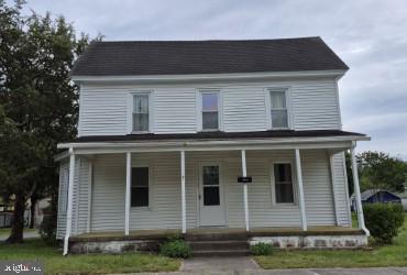Corner in town lot with some shade trees. One can stroll to church, schools, post office and Firehouse fundraising dinners. The Delmar Community park with playground & swings, offers a variety of special occasions including a farmers market. Front porch 7x25. All floors are solid oak hardwood floors. A bow window in living room plus another room (pallor) with non-working FP/mantel. Enjoy family dinners in a large dining room. Kitchen has second staircase to the upper 2nd. floor. This room could be a 4th bedroom which has a private bath w/tub/shower. Attached to another bedroom is a nice size closet (11.6 x 6.8) with adjoining bath with corner shower. Side entrance has a mud room 6.7x14.6. Great place for bringing in the groceries. Several years back the roof was replaced with 30 yr. Architectural Shingles and Thermo-pane windows. Window ac units (4) convey. Home needs some rejuvenation. Being offered "As Is" including the oil hot water baseboard heating/furnace. Possible FHA 203K renovation loan.
Current taxes do not include trash pick up. (215.00 per yr.) or flat rate of $15.00. Water & Sewer front footage fee of $35.00 every three months. Water is $5.25 per 1,000 gallons and Sewer is $6.75 per 1,000 gallons. Buyers confirm all taxes, schools, public utilities charges to their satisfaction.