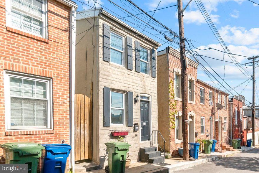 Welcome to this rare find in Upper Fells Point, a move-in ready, fully detached home that offers the best of city living without the typical rowhome noise. Unlike most properties in the area, this two-bedroom, one-bath home shares no party walls, giving you added privacy and peace while still being in the heart of it all. Inside, you’ll find spacious bedrooms, a comfortable family room, and a large, functional kitchen complete with stacked laundry for everyday convenience. Upstairs, a skylight fills the bathroom and hallway with natural light, creating a bright and airy feel that sets this home apart. The entire home has been freshly painted from top to bottom, making it truly move-in ready for its next owner. Ideally located just minutes from Johns Hopkins Hospital, Canton, and the vibrant shops, restaurants, and waterfront of Fells Point, this home offers both convenience and charm in one unique package. It's a rare opportunity to own a detached home in one of Baltimore’s most sought-after neighborhoods you don’t miss it.