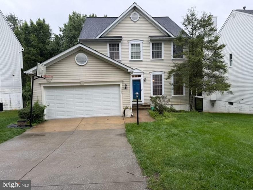 This charming colonial-style residence, nestled in the Village of River Hill, offers 4 bedrooms, 3.5 baths sited on a private lot backing to woods. Step inside to discover a warm and inviting atmosphere which thoughtfully designed floor plan flows effortlessly from the foyer into the living and dinning room, then continues into kitchen & family room. Accentuated by wood floors that flow seamlessly through the main living area.The spacious family room featuring four large windows w/back yard view.The kitchen opens to family room that is well-appointed with 42" oak cabinetry, granite countertop, stainless steel appliances replaced in (2019), including a self-cleaning oven, a refrigerator with an ice maker, and dishwasher.The specious breakfast area is bathed in natural light, casual dining, w/a slid door leading to a deck overlooking the private treed back yard. Upstairs are 3 bedrooms, 2 full baths, new carpet (2026), master suite w/two walk-in closet, a cathedral ceiling w/fan, and boasts a super bath w/separated walk-in shower & tub. Additional highlights include a convenience upper level laundry. The walkout lower level includes a fourth bedroom, full bath, a specious Rec. Room with a slider leading to a new patio (2026), new carpet & paint (2026). Also, new garage foxy coating floor (2026), newer garage door (2025), roof (2021) and A/C (2020).