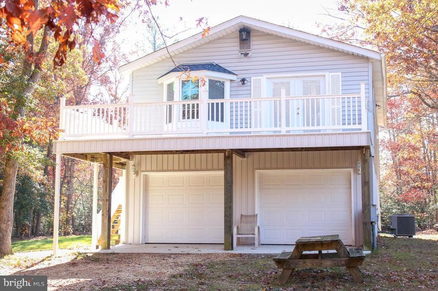 Great Leonardtown garage with with 3 bed 1 bath apartment. This private residence included almost one acre has been fully renovated recently with new heat pumps, cabinets, hot water heater, and much more.  well, septic and all electric utilities.