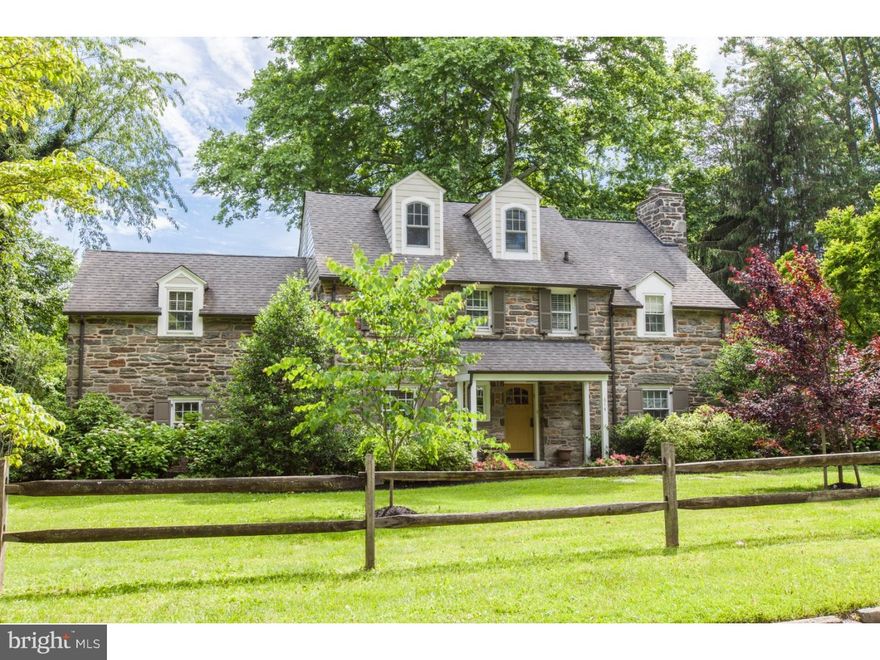 Magnificent and totally renovated stone colonial on a beautiful street in Bryn Mawr. This special home features 4 bedrooms, 4.1 baths, over 4400 square feet on almost half an acre of flat professionally landscaped property with specimen plantings. You must see this home to see all the thoughtfulness and expense that went into putting so many exquisite updates to this home. There are hickory floors in many rooms on the first floor and all rooms on the second floor. The kitchen is truly amazing and is the focal point for cooking and entertaining. There is aa Gaggenau cooktop- 4 burners and  steamer, SubZero glass refrigerator, Wolf double ovens, Miele dishwasher,  solid walnut island, soapstone countertops, handmade subway tile backsplash, glass cabinetry, deep soapstone sink, professional hood with lighting, Butler's Pantry with SubZero wine refrigerator and ice cube maker. There are also walnut surfaces in the office attached to the kitchen. The beamed Family Room is open to the kitchen/breakfast room and makes spending time there warm and comfortable. There is a wide staircase with exposed stone that leads to the basement (there is also an additional staircase to the basement ) which has room for a playroom, additional rooms plus storage. The space is flexible and can be used in many ways. On the first floor there is also a  Sunroom which has engineered hardwood flooring and an outside door to a patio, an Office with a built-in desk, Powder Room with beautiful fixtures and a formal Living Room and Dining Room. On the second floor is the Master Bedroom with a walk-in closet ,Master Bathroom with free standing English tub, Carrera marble. The additional bathrooms have all been updated with high end fixtures. In addition to all these renovations this home has newer electric, plumbing, HVAC, a 2 car garage, outside patio space with a trellis and many newer Marvin windows. This home is a must see gem!!!