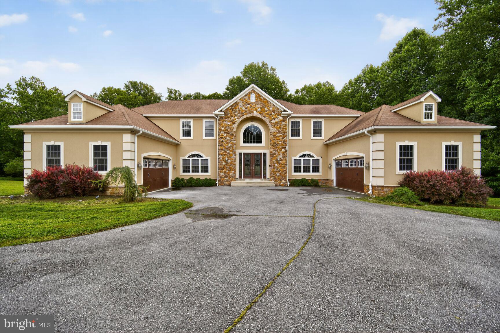 Welcome to 16831 Swanson Road, a breathtaking estate nestled on over 5 private acres in Upper Marlboro. This exceptional residence offers nearly 9,600 square feet of luxury living space, boasting 5 spacious bedrooms and 5.5 beautifully appointed bathrooms.
From the moment you arrive, you’ll be captivated by the grand curb appeal, expansive grounds, and a layout designed for both refined entertaining and comfortable everyday living. Inside, the home features soaring ceilings, a dramatic foyer, multiple living and gathering spaces, and abundant natural light throughout.
The gourmet kitchen is a chef’s dream with high-end appliances, custom cabinetry, and a large island perfect for hosting. Each bedroom includes its own en-suite bathroom, offering privacy and comfort for family and guests alike. The primary suite is a private retreat, complete with a spa-inspired bathroom, sitting area, walk-in closets, and a cozy fireplace for added comfort.
The living room features a beautiful fireplace, creating a warm and inviting focal point for relaxing or entertaining. The finished lower level expands the living space even further, offering a home gym, a private movie theater, and ample space for recreation or gatherings.
Additional highlights include formal and casual dining areas, a dedicated office space, and a 4-car garage. Outside, enjoy the serenity of open green space with endless possibilities—from outdoor entertaining to creating your own private oasis.
Don't miss the rare opportunity to own a luxurious home of this scale and quality in a tranquil, estate-style setting—just minutes from major commuting routes and the best of Prince George’s County.