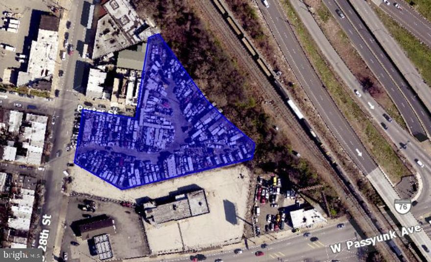 Rare ±1.6-acre heavy-industrial parcel with direct I-76 frontage in South/Southwest Philadelphia. Zoned I-3 (Heavy Industrial), the property offers immediate highway access, excellent visibility, and convenient proximity to Philadelphia International Airport, Center City, and major redevelopment projects. The site straddles the red-hot Bellwether District and is also near the Quartermaster redevelopment, supporting long-term demand, value growth, and broader commercial activity. Located within a long-established industrial corridor with minimal residential adjacency, the site is ideal for salvage, towing, recycling, automotive, contractor, or other outdoor-intensive industrial uses. Truck-friendly streets and decades of continuous automotive use help reduce entitlement risk and support continued operations. As centrally located heavy-industrial land with direct highway exposure becomes increasingly scarce, 2501 S 28th Street presents a rare infill opportunity with strong land value, excellent logistics, and long-term investment potential.