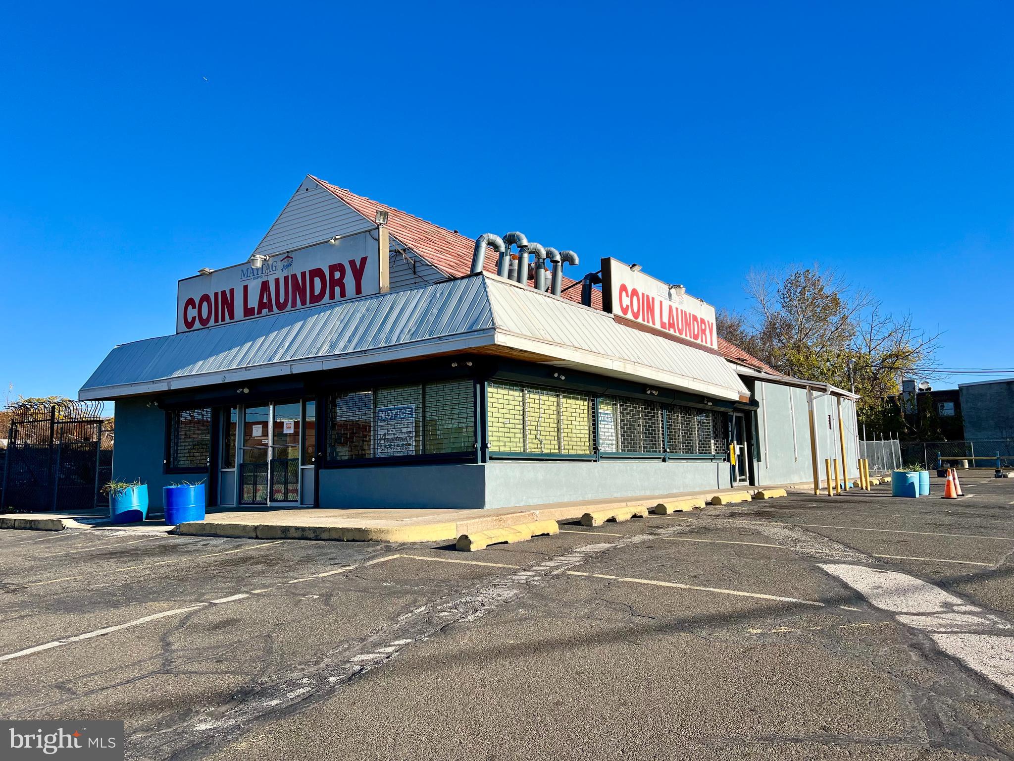 RARE OPPORTUNITY to own this very unique & LARGE CORNER Property with an extremely huge parking lot that can fit over 50 vehicles (Tax ID#: 882005680)! This Property is about 3,600 sq. ft. and the entire Lot size is about 36,547 sq. ft.! This property sits on about 16 lot addresses!
Seller is also selling separately a very big plot of Land directly next door to this Property that is also up for Sale (Tax ID: 885949820)! That entire Lot size is about 15,462 sq. ft.! This separate Lot sits on about 4 lot addresses!
The current use is a Laundromat Business (Owner operated). However, this is zoned as I-2, which is flexible for many types of businesses. The possibilities are endless with this spacious property on a heavy traffic area.
The FOCUS of the sale is the real estate property & the BIG LOT that it is sitting on. The Laundromat business can be given to anyone who buys this, but Sellers are NOT selling based on the laundromat business.
This spacious Laundromat is setup as a Coin Laundromat Business that consists of 46 Dryers & 41 Washers. Take advantage of this rare opportunity before it's gone! Laundromat space has tile floors throughout with ceiling fans. Plenty of natural lights shining T/O entire Laundromat to help you save on energy bills! There is a half bathroom on the side the Laundromat. There is a Utility Room towards the back of the Laundromat.
The following items were recently updated by Owner: New Stucco (2021), Newer 6 inch Sewer Line (2018), New Central Heating System (2021), New Gas Hot Water Heater (2021), Newer Aluminum Roof & Rubber Roof (2018). There are also video surveillance cameras from outside the property!
Start off your new business or investment with this very low maintenance property! Buyer is responsible to reach out to the City for any zoning questions or use variance.
Your investment possibilities are endless w/ this very large CORNER Commercial Property! Possible Redevelopment Opportunity! Property is being sold strictly in AS-IS, WHERE-IS condition! Buyer is responsible for any & all repairs (if needed). Septa bus / trolley stops & public transportation are easily accessible in the area! Close to shopping centers/plazas, supermarkets, stores, gyms, restaurants, parks, & much more! Easy access to all major highways! Minutes away from Temple University School of Pharmacy, Temple Medical Schools, Temple University Hospital, Temple University Main Campus, & many more! PRICED VERY COMPETITIVELY TO SELL!! Get an offer in quickly before it's gone!!
Please Note: There have been some notices that were sent to the neighborhood to notify people of a proposed Big Redevelopment Project of Multi-Family Household Living with 80 Dwelling Units with Parking Spaces for the property (1020-30 W. Sedgley Avenue) directly across the street from this subject property! IF this big project is successfully approved or work is kicking off, Sellers are looking to increase the Asking Price of this property once that starts to break ground.