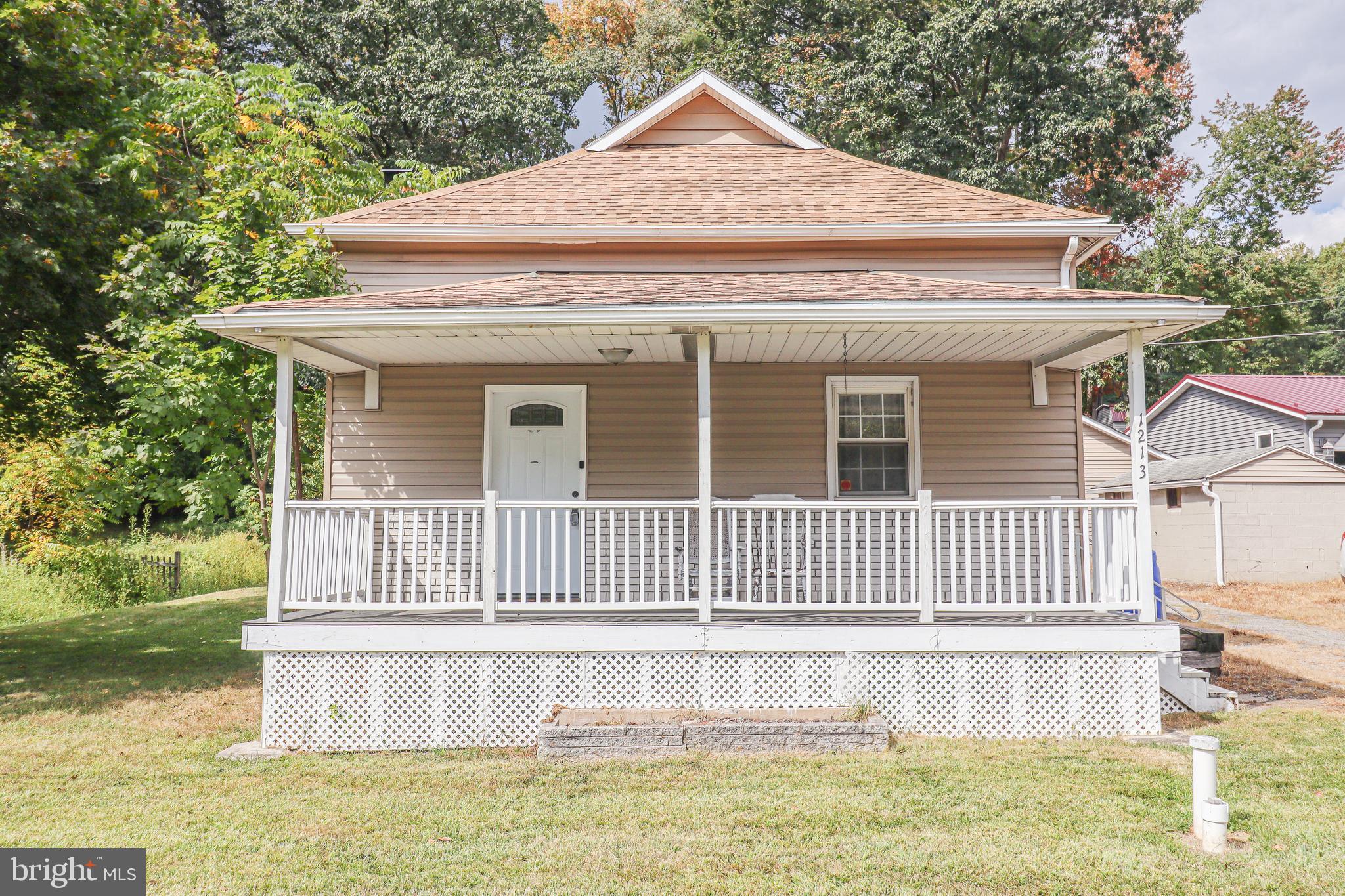 This well-maintained 3-bedroom, 2-bathroom home offers a versatile layout and a welcoming atmosphere. Originally built in 1924, this charming home has been thoughtfully and thoroughly remodeled - beginning in 2017 and completed by the current owners - offering the perfect blend of classic character and modern updates.
The main floor features a semi-open floor plan that includes an inviting entryway, cozy living room with a wood or coal-burning stove, a bright dining area, and a functional kitchen. Also on the main level is the spacious primary suite complete with a walk-in closet and full en-suite bathroom, a second bedroom, full second bath, laundry area, and a convenient mudroom. A mini-split system provides efficient heating and cooling throughout the main floor for year-round comfort.
Upstairs, you'll find a generously sized third bedroom with a large closet. It is perfect as a guest, office, bonus space, or additional living space.
Outside, enjoy a fully usable yard with a covered concrete patio, fire pit, and seating area. This is a great space for entertaining or relaxing outdoors. Additional features include a detached 1-car garage and a storage shed.
This move-in-ready home combines updated interiors with outdoor space and functionality! A perfect blend of comfort, space, and practicality! This home is ready for its next chapter! Don’t miss the opportunity to make it yours!