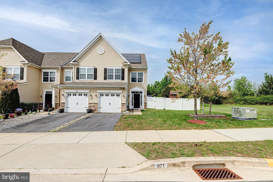 Welcome to 971 Lansdowne Rd - the house you've been waiting to call home. This home has it all, providing an endless list of stunning upgrades while offering both comfort and style that can't be beat. Located in Willow Grove Mill, this location is just minutes from major roadways like Rt 1 and Rt 13, perfect for commuters and beach goers alike, as well as just minutes from local grocery, restaurants, and award-winning schools in Appoquinimink School District. Upon arrival, this end-unit townhome on a large corner lot in a cut-de-sac will stun you with its curb appeal, fenced yard, and one-car garage. Hardwood floors gleam beneath your feet as you enter into the foyer, where fresh neutral paint gives a warm welcome. The large family room offers the perfect place for your family to gather, while the beautiful kitchen offers both aesthetic and function, complete with stainless steel appliances, center island, and granite counter tops. The sunroof extension glows with natural light and offers access to the large rear yard with privacy fencing. Upstairs, a sprawling primary bedroom with a walk-in closet and full primary bath with double vanity offer an incredible owner's suite, while two generously sized bedrooms share a full hall bathroom. Also on the second level, the epitome of convenience - second floor laundry! Don't forget to check out the third floor loft, the perfect flex space to utilize as a bedroom space, office, movie room, the possibilities are endless! Solar panels make the efficiency a dream, and the many upgrades make this home an incredible value. Don't let it pass you by!