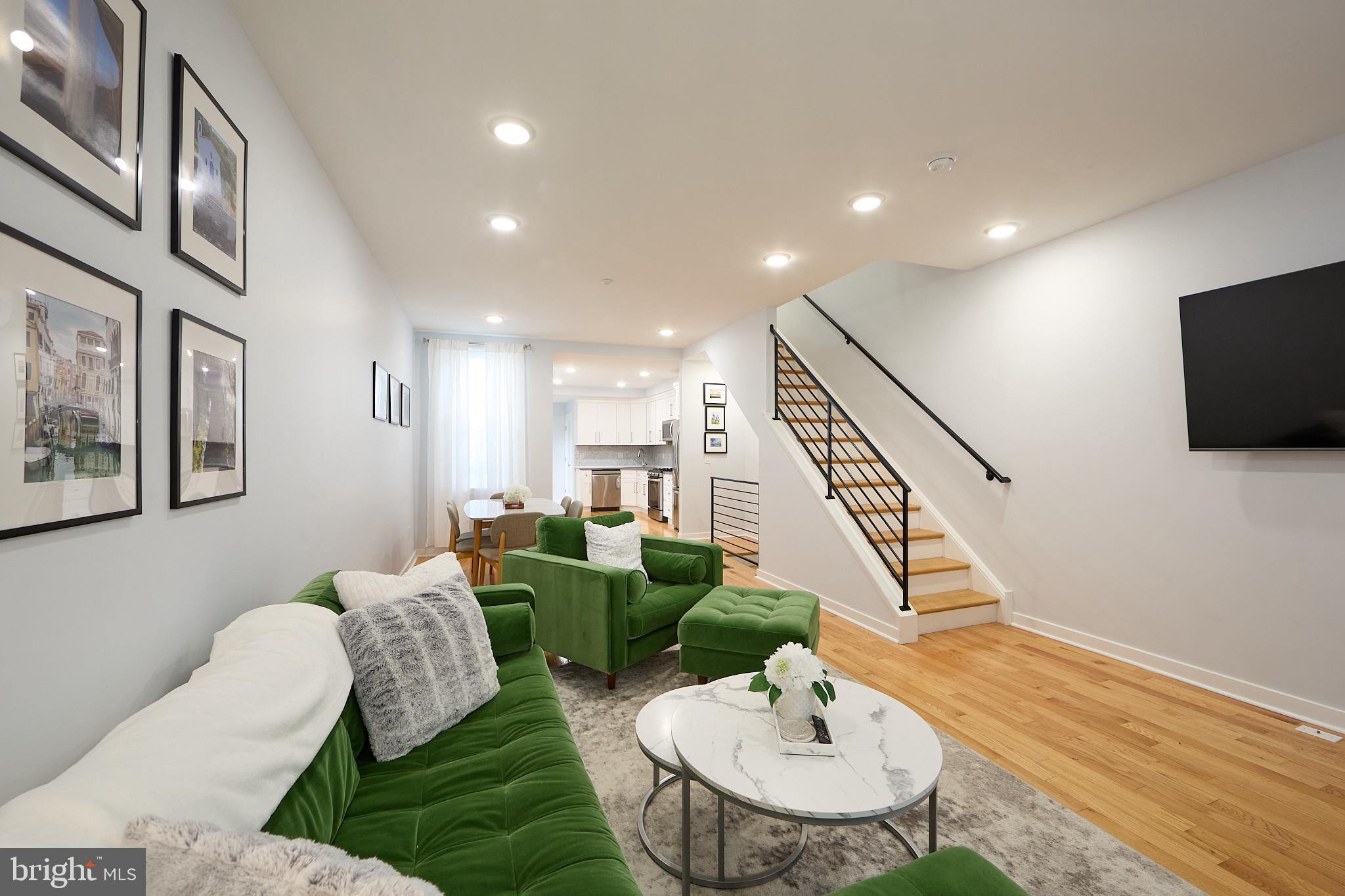 Urban retreat and upscale city living in this 3 Bedroom 2.5 Bath townhome! Open concept, high ceilings, recessed lighting, and posh hardwoods is the canvas where design meets décor. The living room flows seamlessly into the dining area and chef’s gourmet kitchen. Carrera marble backsplash and Quartz countertops complement the 42” Shaker white cabinetry, stainless steel appliances & natural gas range. The first floor gives patio access for outdoor relaxation and a powder room offers finishing touch for all hosting experiences. With proximity to Girard College offers views of the esteemed and historic campus. The upper level offers two spacious bedrooms with closets that offer upgraded built-ins to maximize storage and functionality. A huge hall bath, and laundry on this floor. The third floor is the Primary En Suite! A gloriously sized bedroom with walk-in/built-in closet and designer doors, an oversized luxury master bath with marble shower. Fully finished basement makes for endless possibilities between work, work out and play. Location is key in the Fairmount/Brewerytown area. Features & Benefits include New Roof, New Hot Water Heater, New Heating & Air Conditioning System and 3 year Tax abatement offers discounted property taxes. The culture only just begins with the Girard Museum; continue your experience with Boathouse Row, Fairmount Park, The Philadelphia Zoo, The Philadelphia Museum of Art, and the ultimate in restaurants and coffee shops! Space on Girard Ave is premium, elegant and waiting for you!! Tour Today!!