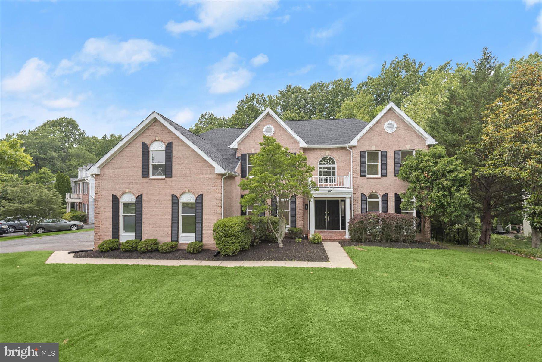 Exceptional North Potomac Retreat in The Woods at Muddy Branch – Wootton Cluster!
Discover this stately brick-front home nestled on a tranquil, wooded .43-acre lot in the coveted Woods at Muddy Branch community. Boasting over 7000 square feet of beautifully finished living space across three levels, this 6-bedrooms, 4 full and 2 half baths residence offers the perfect balance of elegance, comfort, and functionality.
A grand two-story foyer welcomes you inside, flanked by formal living and dining rooms adorned with hardwood floors and large windows. The spacious family room impresses with soaring ceilings, a dramatic floor-to-ceiling stone fireplace, and expansive atrium windows that frame serene wooded views. A private main-level study offers a quiet space to work from home, easy to convert to multigenerational living as there is a second half bath with a shower.
At the heart of the home, the gourmet kitchen is a chef’s dream, complete with custom cabinetry, granite and quartz countertops, a large center island, double wall ovens, a gas cooktop, and a walk-in pantry. A butler’s pantry provides added storage and serving space. The adjoining sunroom and breakfast area are bathed in natural light, leading out to a large deck and screened-in porch—ideal for outdoor entertaining or quiet relaxation. There is a mud room and laundry on the main level for additional convenience!
Upstairs, the luxurious primary suite features a sitting area, tray ceiling, oversized walk-in closet, and a spa-like bath with dual vanities, a soaking tub, and a separate shower. There is a washer/dryer in the primary bathroom. Two secondary bedrooms share a Jack & Jill bath, while another junior suite includes its own private bath and walk-in closet. The upper hallway overlooks the dramatic family room below.
The fully finished walk-out lower level is designed for entertaining and extended living, featuring a spacious recreation room with a second kitchen, a sixth bedroom with an en-suite bath, and abundant storage. Glass doors open to a lower patio. A new deck will be installed before closing!
All of this in a quiet, tucked-away location just minutes from Muddy Branch Square, Crown, Kentlands, and major commuter routes. Zoned for the award-winning Wootton High School cluster, this stunning home is a rare find. Don’t miss your opportunity—schedule your private tour today!