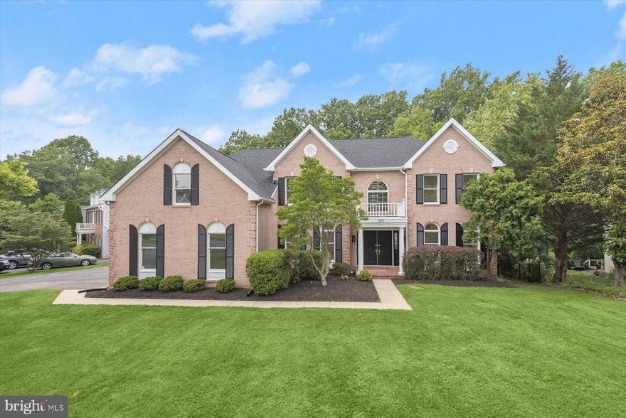 Exceptional North Potomac Retreat in The Woods at Muddy Branch – Wootton Cluster!

Discover this stately brick-front home nestled on a tranquil, wooded .43-acre lot in the coveted Woods at Muddy Branch community. Boasting over 7000 square feet of beautifully finished living space across three levels, this 6-bedrooms, 4 full and 2 half baths residence offers the perfect balance of elegance, comfort, and functionality.

A grand two-story foyer welcomes you inside, flanked by formal living and dining rooms adorned with hardwood floors and large windows. The spacious family room impresses with soaring ceilings, a dramatic floor-to-ceiling stone fireplace, and expansive atrium windows that frame serene wooded views. A private main-level study offers a quiet space to work from home, easy to convert to multigenerational living as there is a second half bath with a shower. 

At the heart of the home, the gourmet kitchen is a chef’s dream, complete with custom cabinetry, granite and quartz countertops, a large center island, double wall ovens, a gas cooktop, and a walk-in pantry. A butler’s pantry provides added storage and serving space. The adjoining sunroom and breakfast area are bathed in natural light, leading out to a large deck and screened-in porch—ideal for outdoor entertaining or quiet relaxation. There is a mud room and laundry on the main level for additional convenience!

Upstairs, the luxurious primary suite features a sitting area, tray ceiling, oversized walk-in closet, and a spa-like bath with dual vanities, a soaking tub, and a separate shower. There is a washer/dryer in the primary bathroom. Two secondary bedrooms share a Jack & Jill bath, while another junior suite includes its own private bath and walk-in closet. The upper hallway overlooks the dramatic family room below.

The fully finished walk-out lower level is designed for entertaining and extended living, featuring a spacious recreation room with a second kitchen, a sixth bedroom with an en-suite bath, and abundant storage. Glass doors open to a lower patio. A new deck will be installed before closing!

All of this in a quiet, tucked-away location just minutes from Muddy Branch Square, Crown, Kentlands, and major commuter routes. Zoned for the award-winning Wootton High School cluster, this stunning home is a rare find. Don’t miss your opportunity—schedule your private tour today!