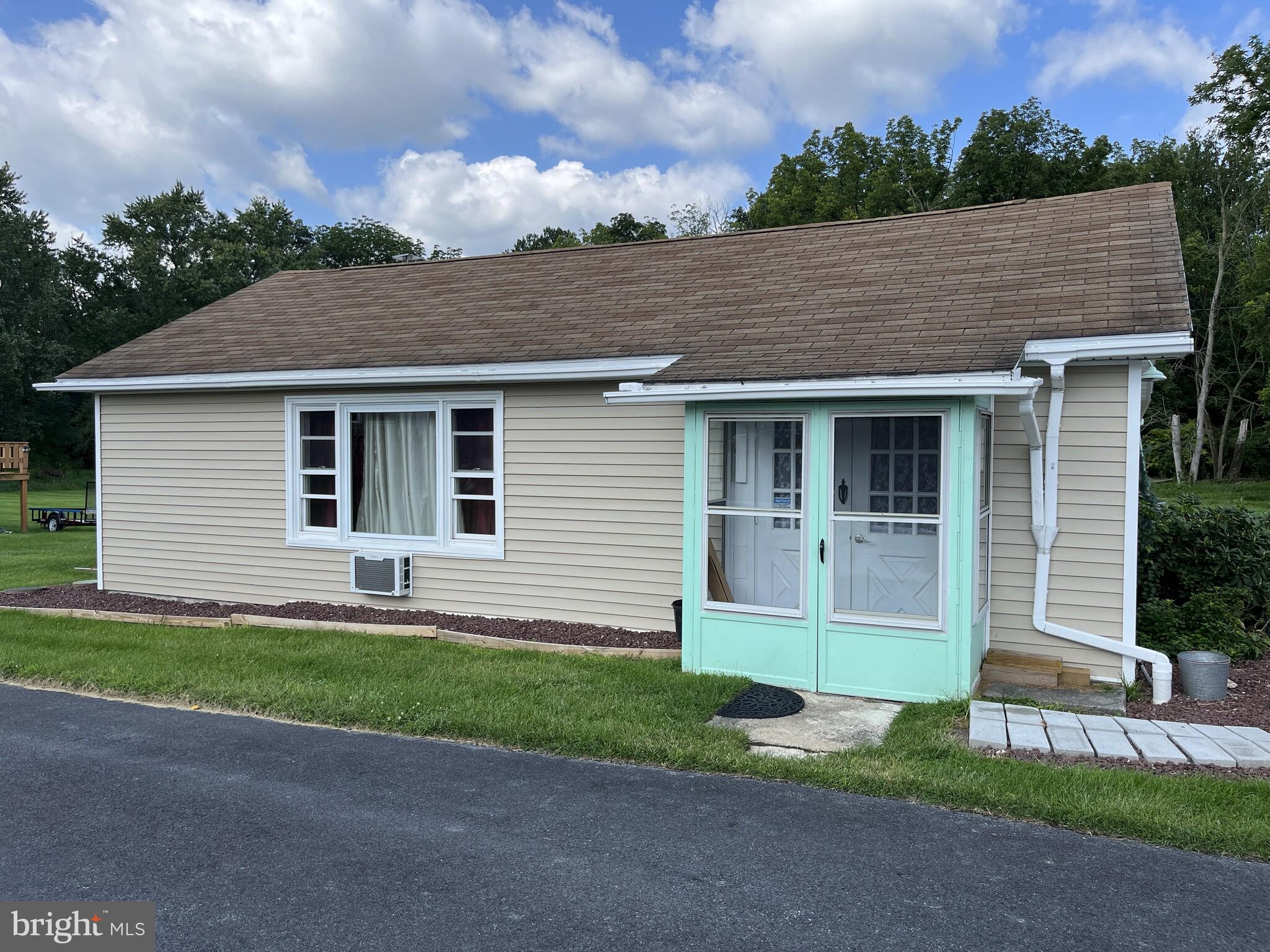 The listing includes the corner property located at 5704 Allentown Pike. This High-Visibility Commercial Property – Located at the busy intersection of Route 222 (Allentown Pike) and Dries Road, this high-visibility property sees over 30,000 vehicles per day. With direct access from both Dries Road and a dedicated turning lane into the property, it offers convenience and strong traffic exposure for a variety of commercial uses.
Zoned General Commercial, the main building—formerly the Willow Creek Lodge—is ideal for a restaurant, café, retail, or office use. The existing parking area can be easily expanded to support future growth.