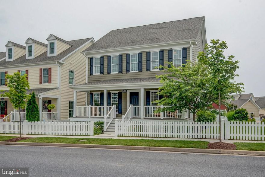 Stunning home: every upgrade today's savvy buyer wants--2 1st floor fireplaces, gourmet kitchen: SS appliances (commercial grade oven), granite, huge center island, white cabinetry, dark hardwoods, 7 1/2 foot doors on 1st level, crown molding. Dream mudroom w/ closet & cubbies. Master suite w/walk-in closet, luxe bath w/soaking tub, 2nd fl laundry. Fin. basement w/ full bath. Front & side porches!